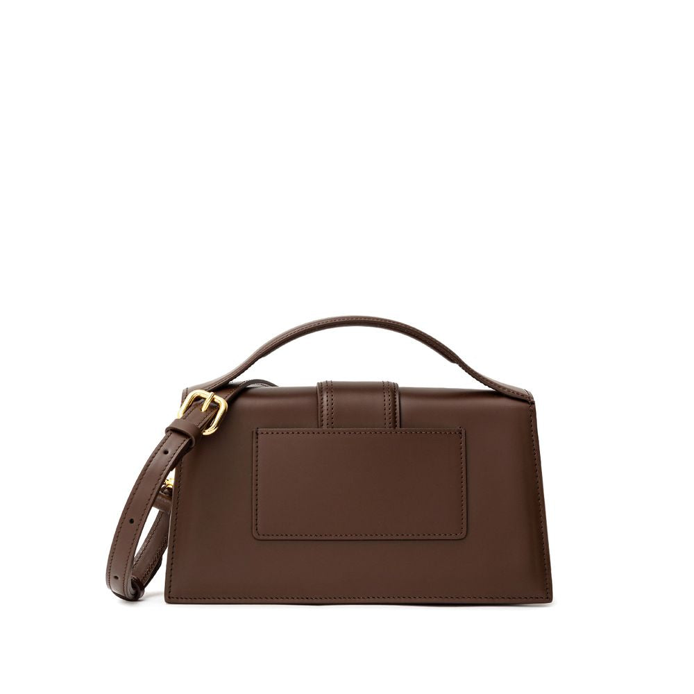 Elevate your style with the Jacquemus Brown Leather Handbag, a masterpiece of exquisite craftsmanship in 100% leather, embodying luxury and sophistication for every occasion.