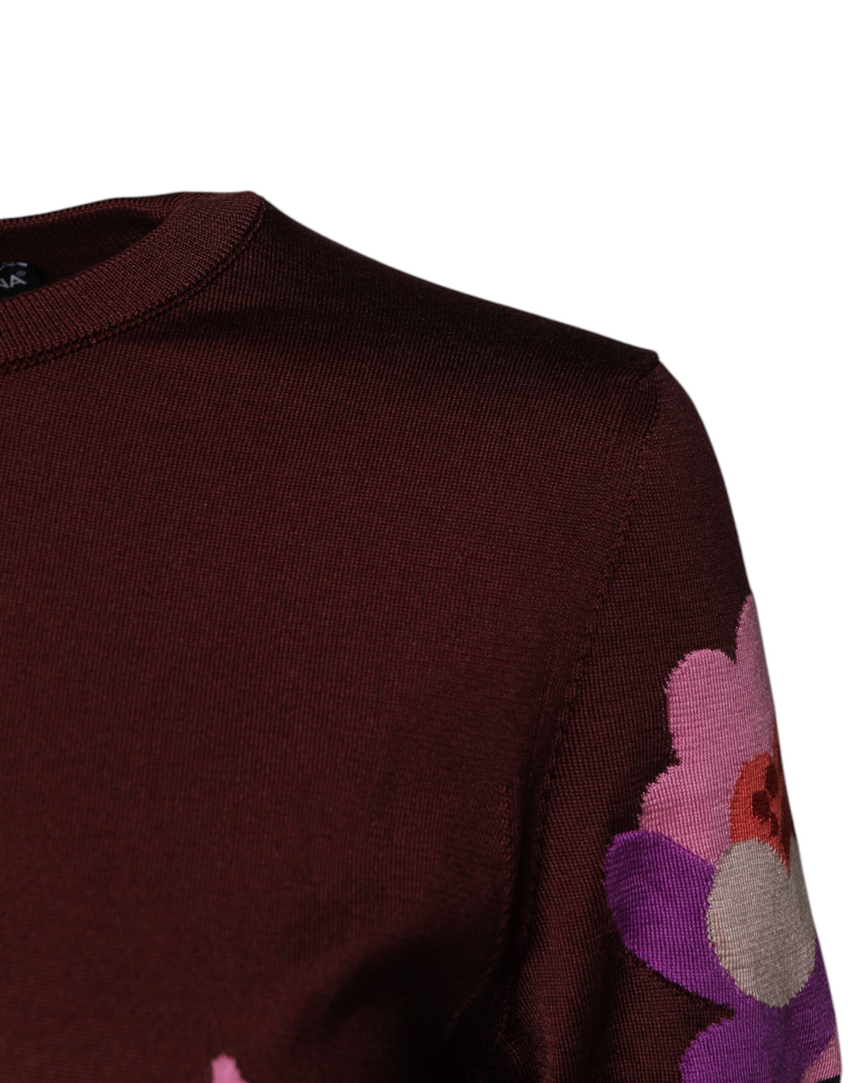 Elevate your elegance with the Dolce & Gabbana Maroon Floral Silk Crew Neck Blouse, a masterpiece of Italian craftsmanship that embodies luxury and sophistication.