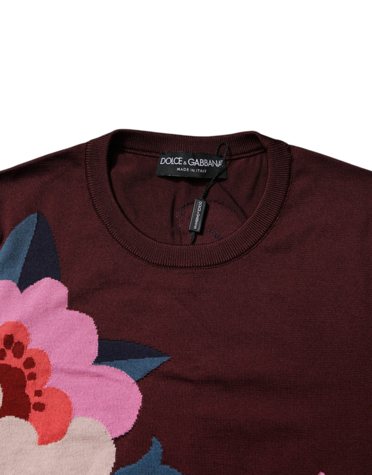 Elevate your wardrobe with the Dolce & Gabbana Maroon Floral Silk Crew Neck Blouse, a masterpiece of Italian craftsmanship that embodies elegance and allure.