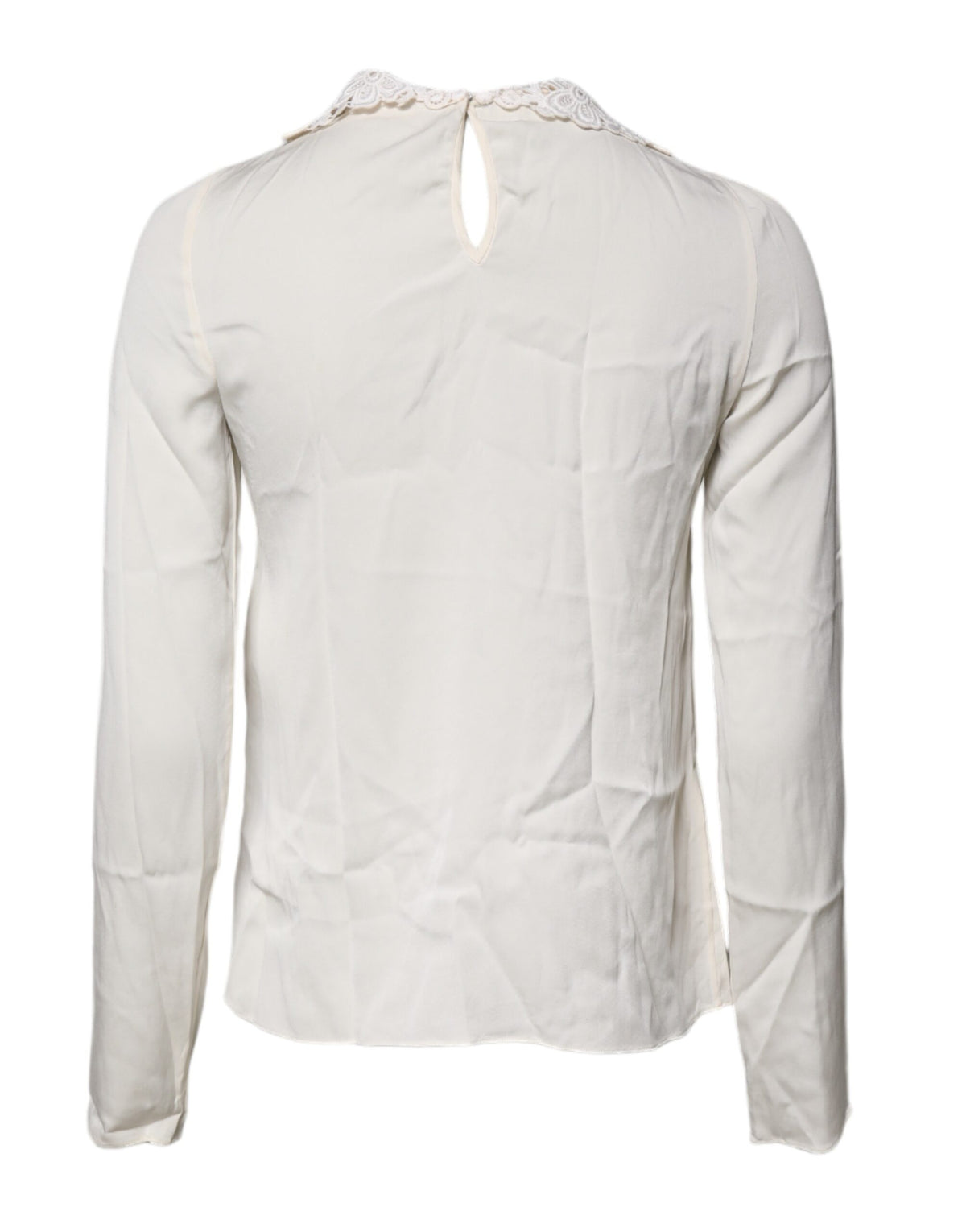 Experience the allure of Dolce & Gabbana's Cream Floral Lace Long Sleeves Blouse, a masterpiece of Italian craftsmanship, blending silk and cotton for timeless elegance.