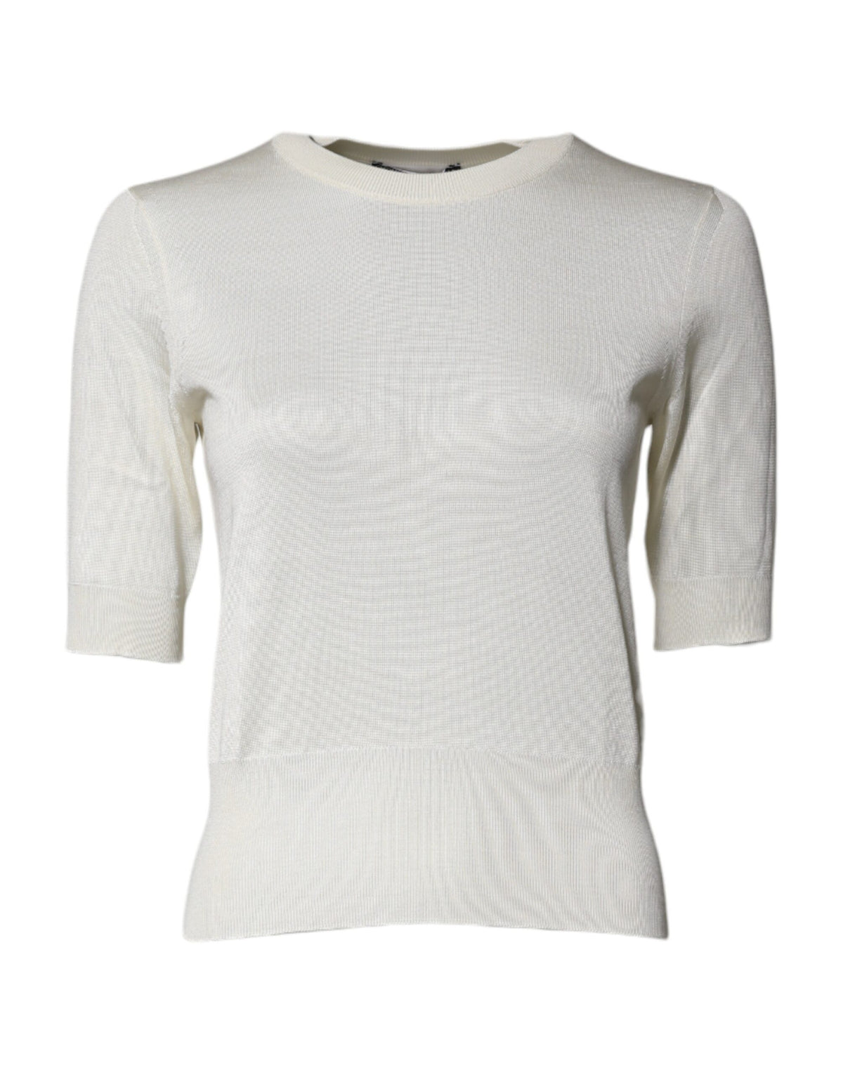 Experience the allure of Dolce & Gabbana's Cream Silk Blouse, a timeless piece crafted from 100% silk, embodying elegance and sophistication for the discerning individual.