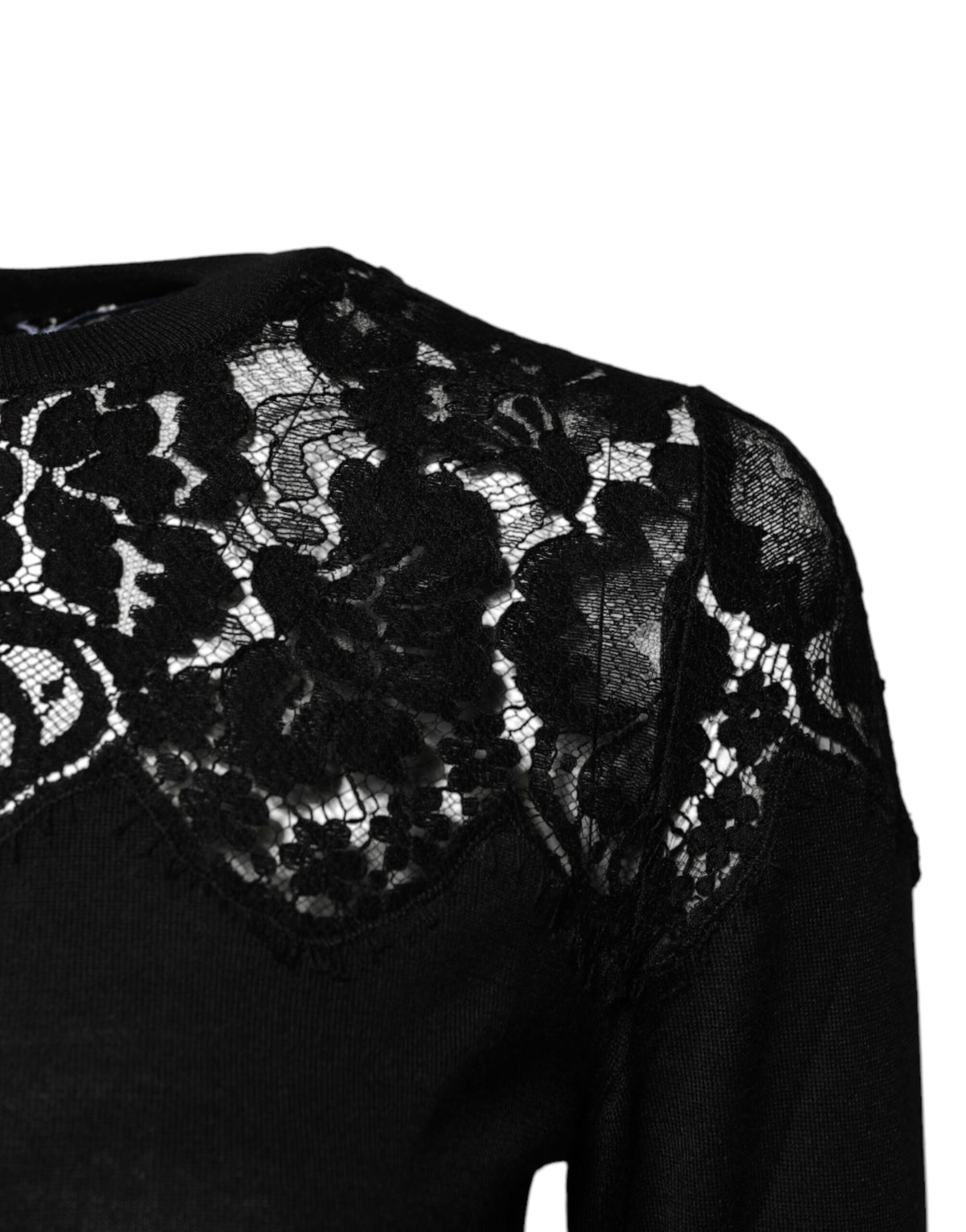 Experience the allure of Dolce & Gabbana's Black Floral Lace Long Sleeves Blouse Top, where exquisite craftsmanship meets luxurious materials for timeless elegance.