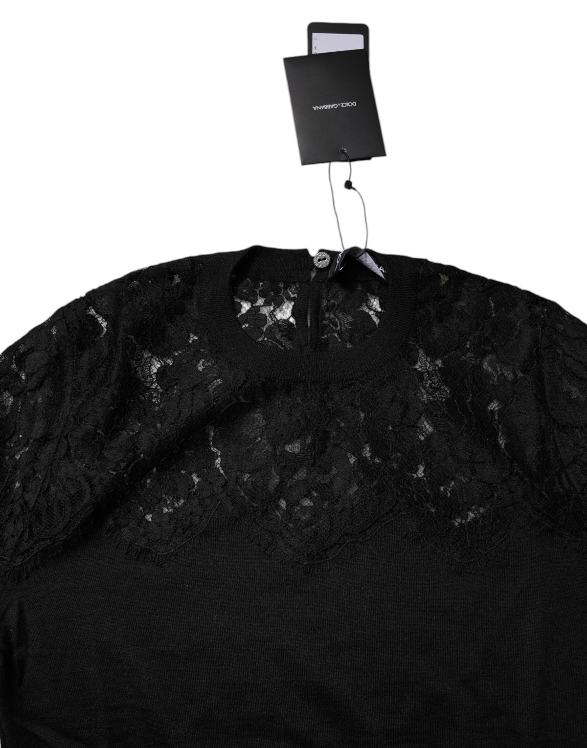 Discover the Dolce & Gabbana Black Floral Lace Long Sleeves Blouse Top, a luxurious blend of cashmere and silk, embodying timeless elegance and exquisite craftsmanship for the discerning individual.