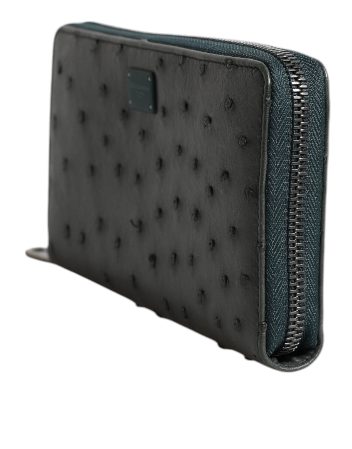 Indulge in the exquisite Dolce & Gabbana Green Ostrich Logo Plaque Zip Around Continental Wallet, a luxurious blend of craftsmanship and sophistication, perfect for the discerning individual.