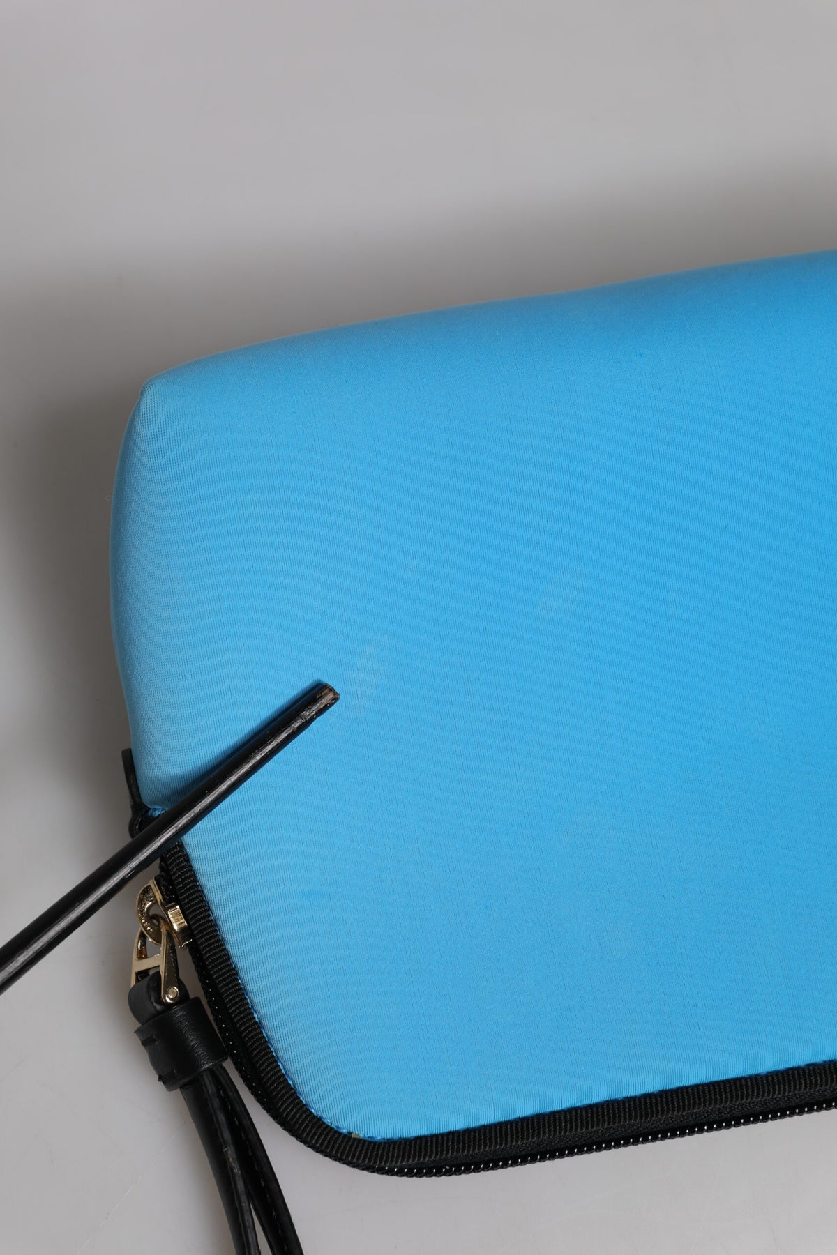 Elevate your style with the Dolce & Gabbana Blue DG Logo Print Clutch, a luxurious blend of nylon and spandex, crafted in Italy for the discerning connoisseur.
