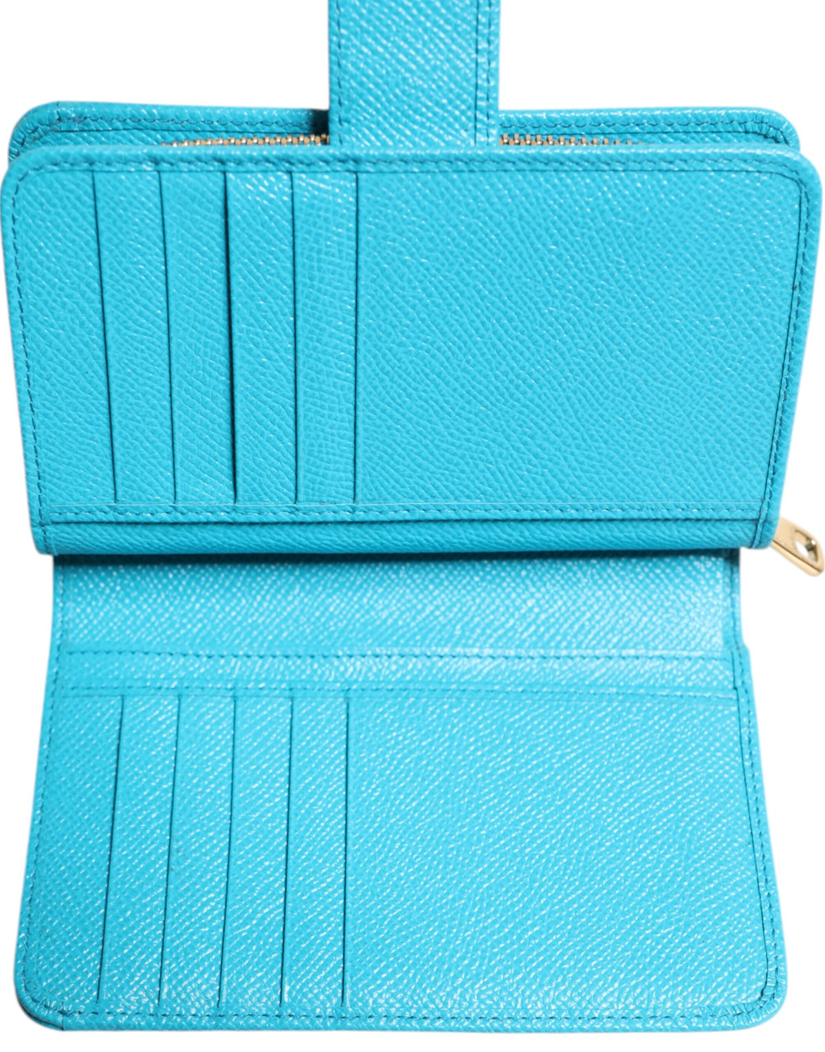 Experience the exquisite allure of the Dolce & Gabbana Light Blue Leather Bifold Continental Clutch Wallet, a testament to Italian craftsmanship and timeless elegance.