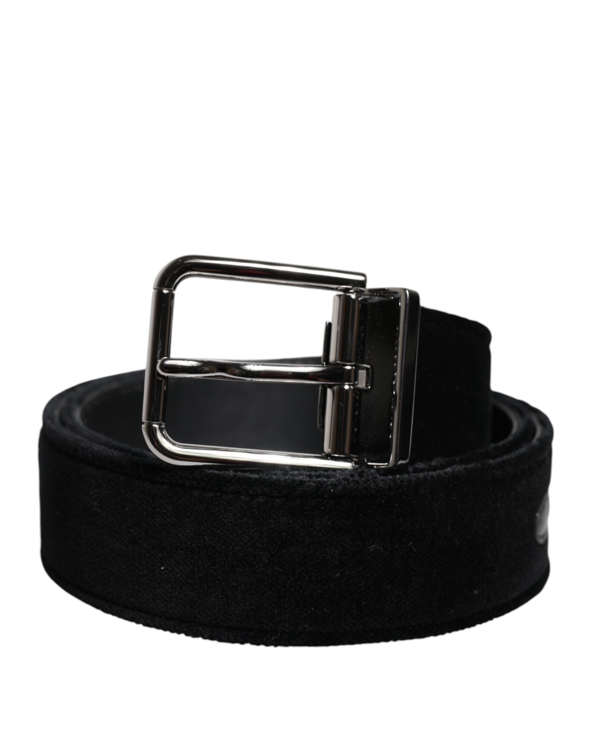 Indulge in the exquisite Dolce & Gabbana Black Cotton Silver Tone Metal Buckle Belt, a timeless luxury piece that embodies sophisticated craftsmanship and versatile elegance.
