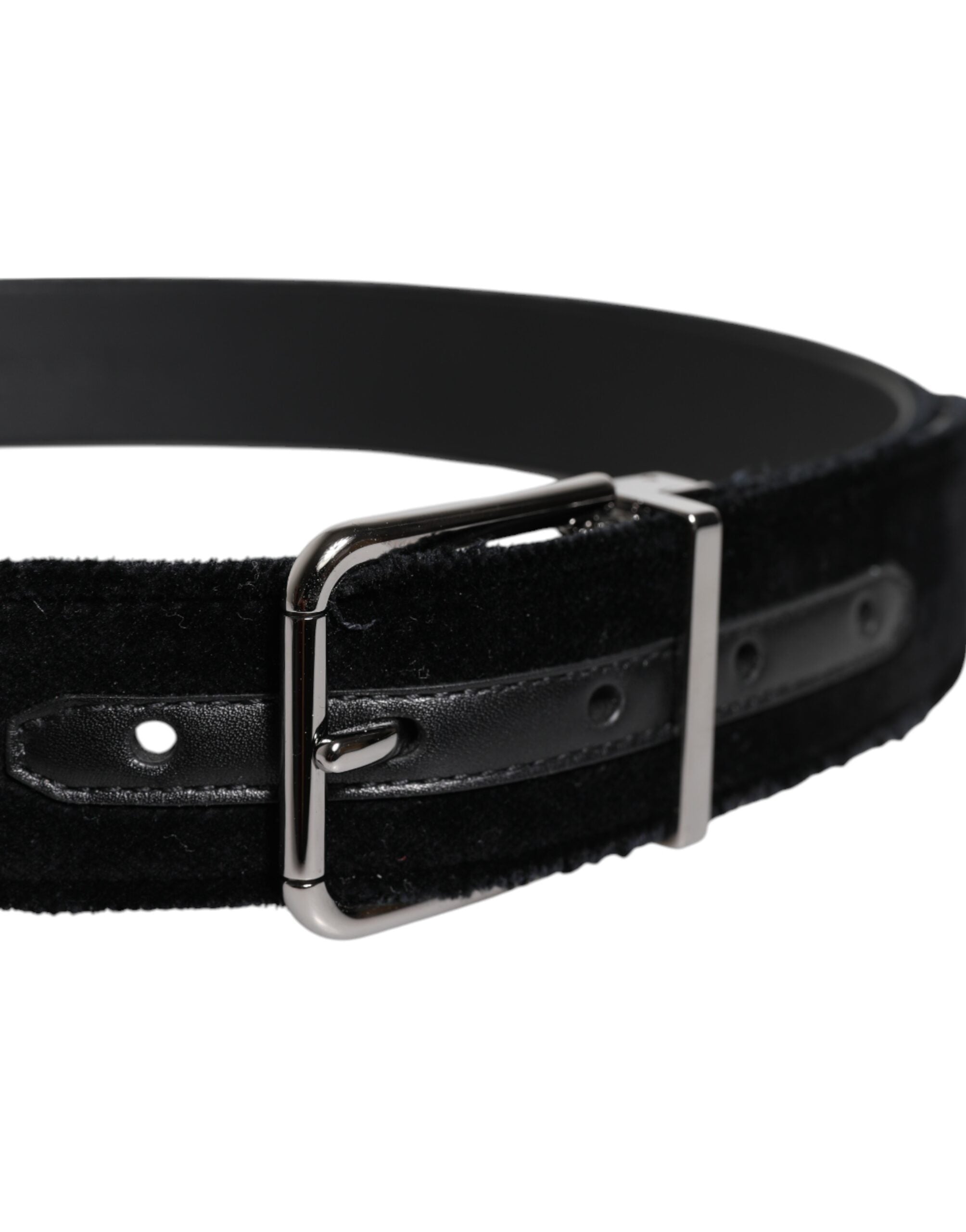 Indulge in the exquisite Dolce & Gabbana Black Cotton Silver Tone Metal Buckle Belt, a testament to Italian craftsmanship that elevates your style with timeless luxury and versatility.