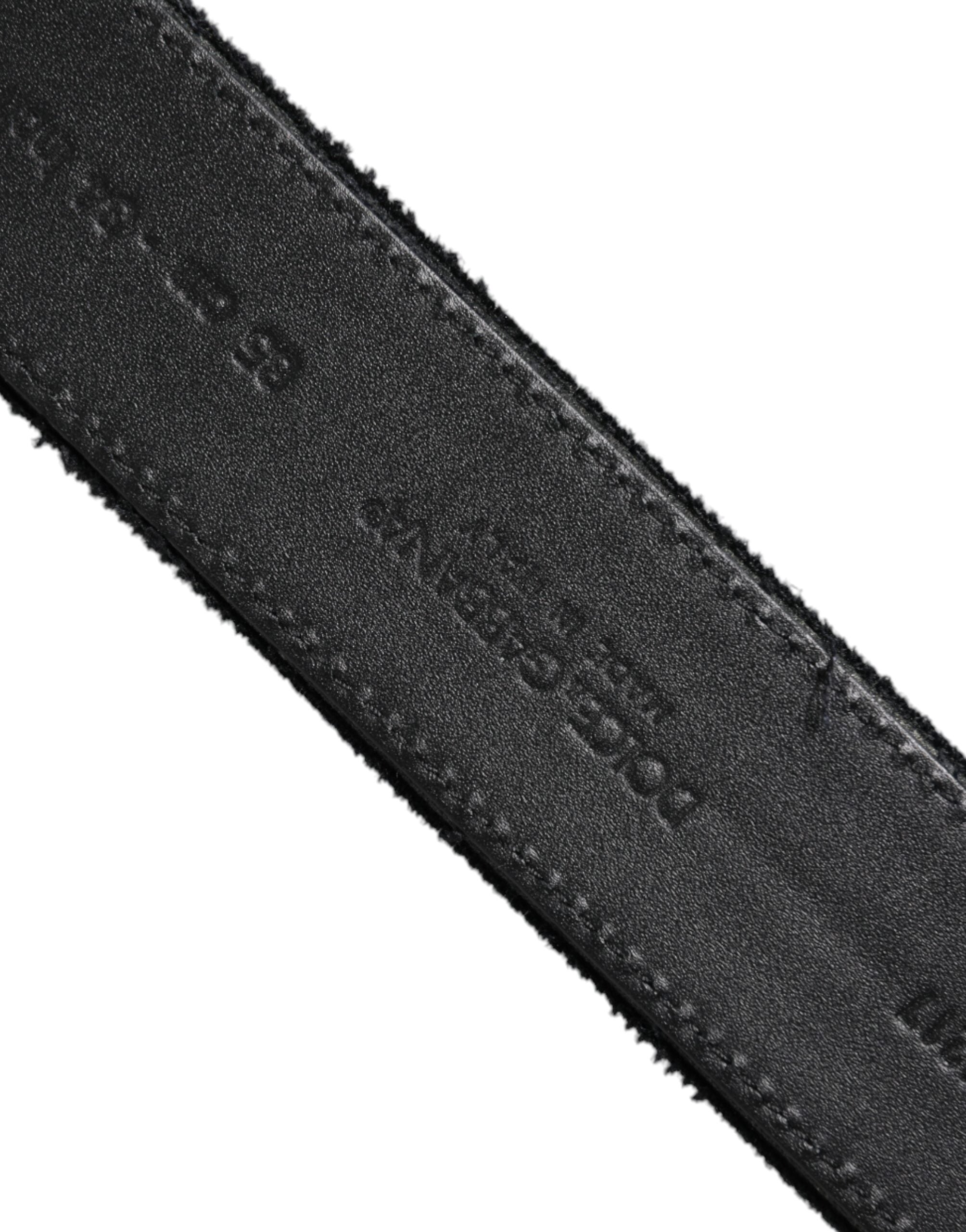 Elevate your style with the Dolce & Gabbana Black Cotton Silver Tone Metal Buckle Belt, a masterpiece of Italian craftsmanship that embodies timeless luxury and sophistication.