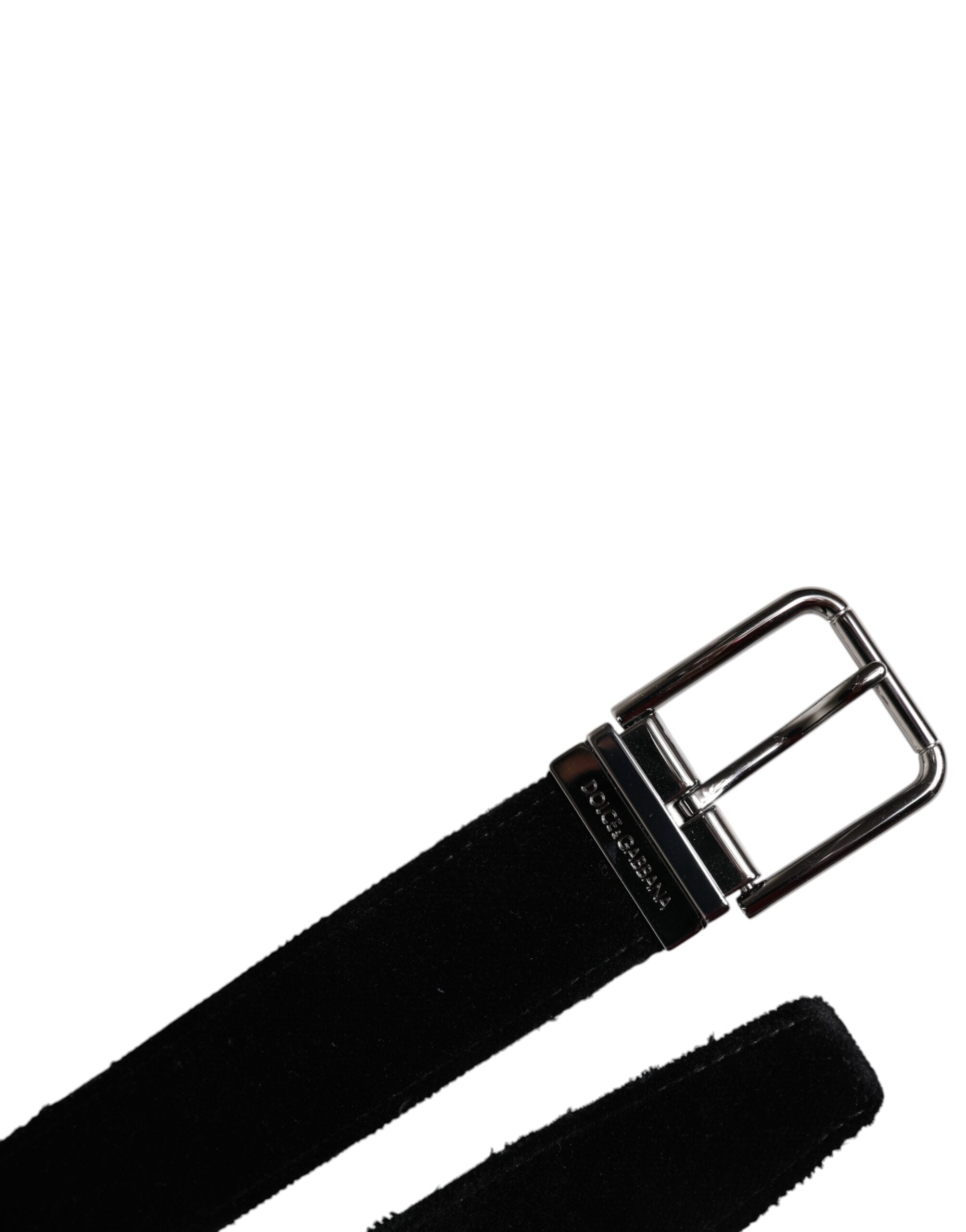 Indulge in the exquisite Dolce & Gabbana Black Cotton Silver Tone Metal Buckle Belt, a testament to Italian craftsmanship and timeless luxury, perfect for elevating any ensemble.