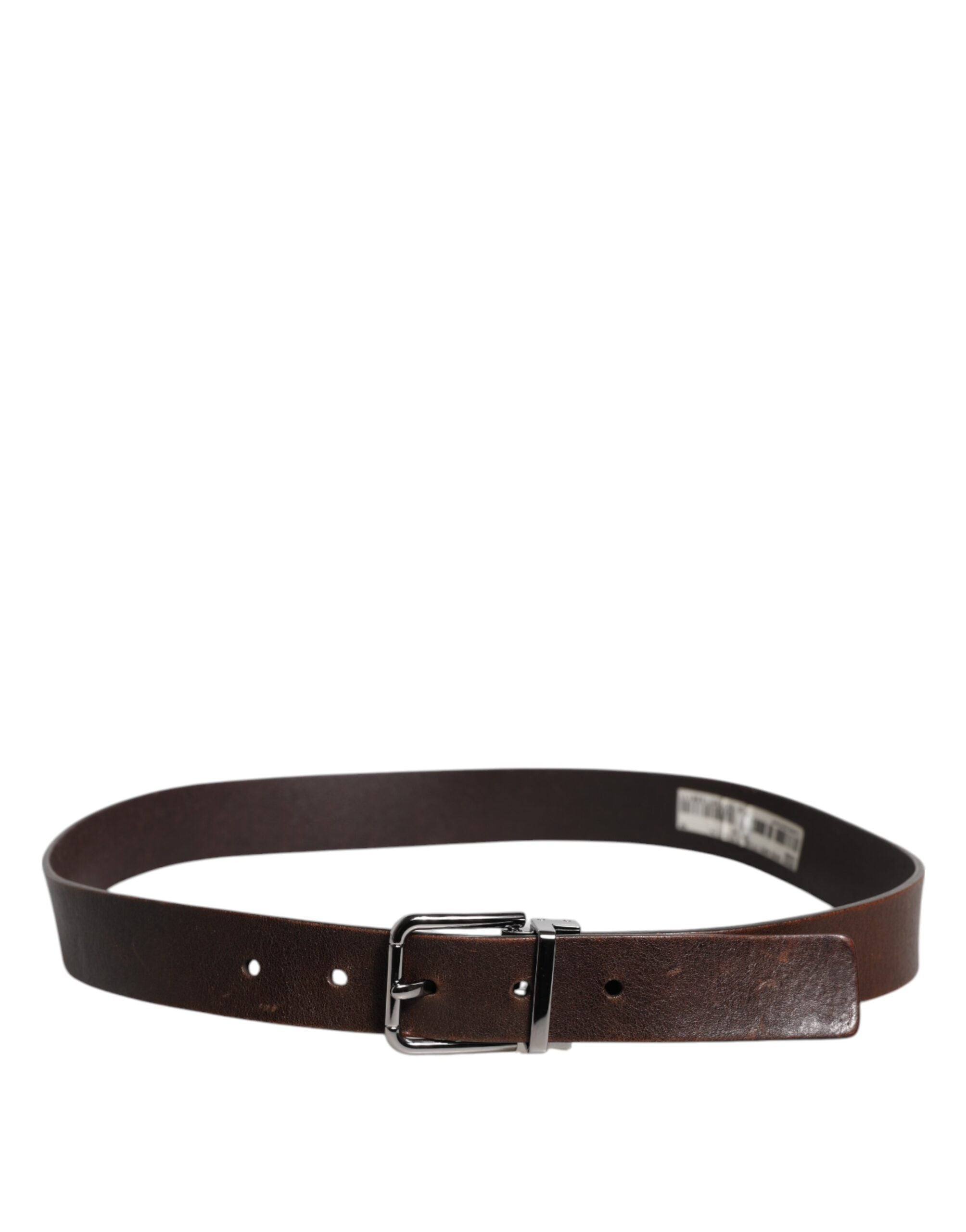Indulge in the exquisite Dolce & Gabbana Brown Leather Classic Metal Logo Buckle Belt, a timeless statement of luxury and sophistication, crafted for the discerning individual.