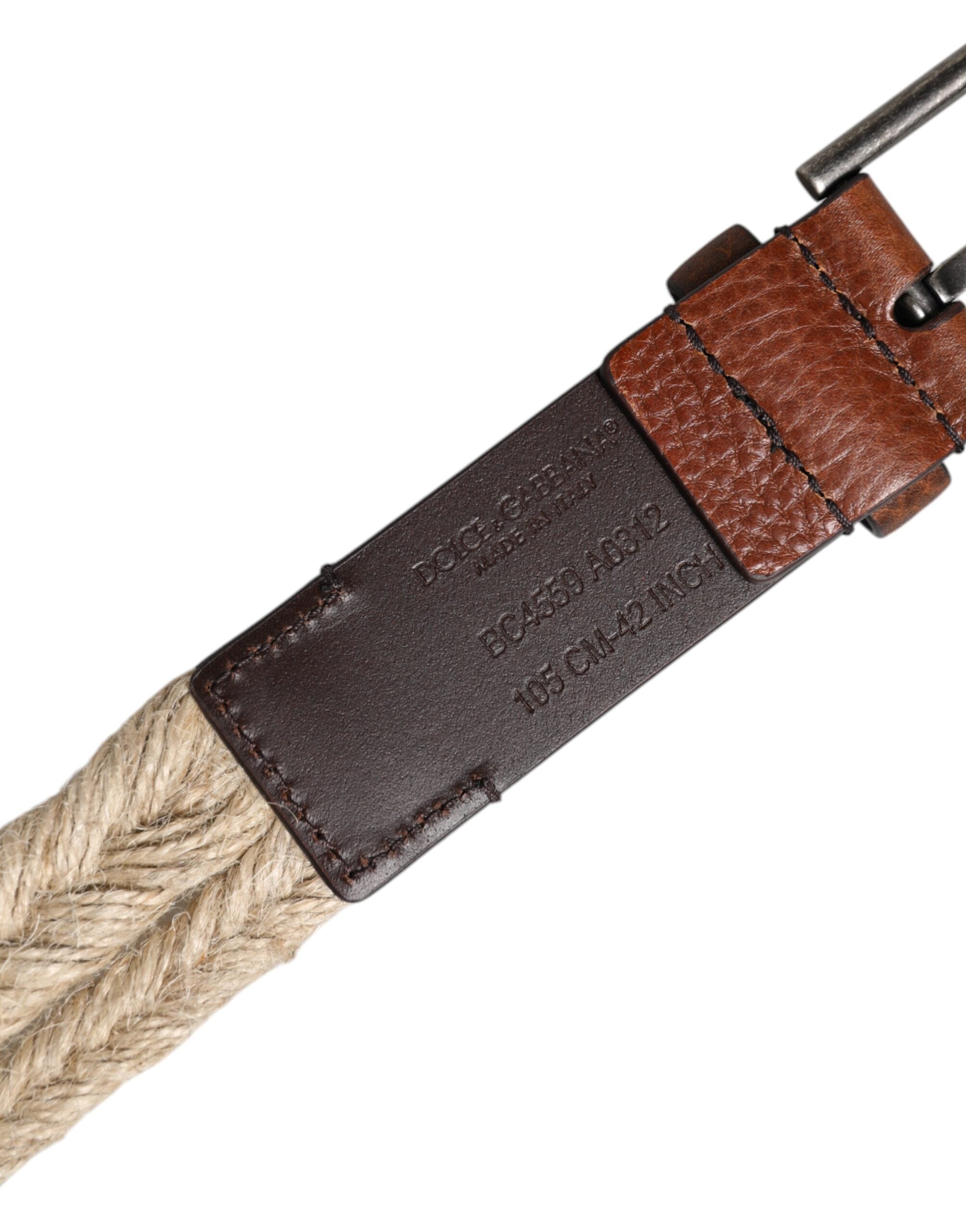 Elevate your style with the Dolce & Gabbana Brown Jute Leather Woven Metal Buckle Belt, a luxurious blend of jute and calf leather, embodying timeless elegance and artisanal craftsmanship.