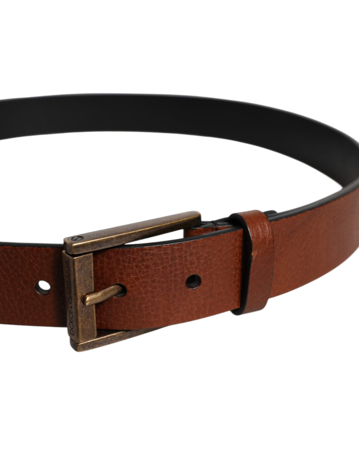 Indulge in the exquisite Dolce & Gabbana Brown Calf Leather Classic Metal Buckle Belt, a timeless accessory that elevates your style with artisanal elegance and luxurious craftsmanship.