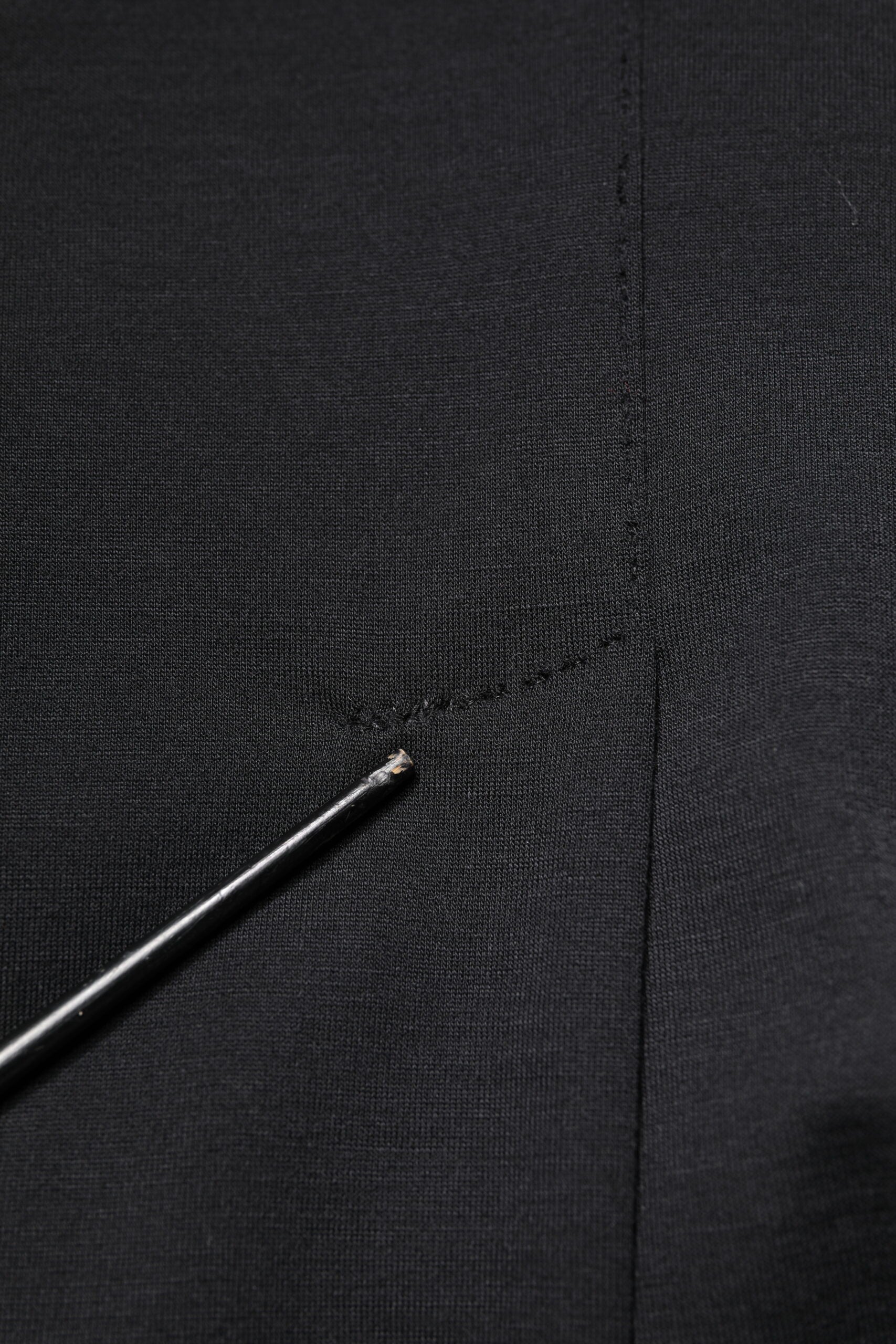 Experience the allure of Dolce & Gabbana's Black Wool Slim Fit Blazer, a masterpiece of Italian craftsmanship, blending luxury and sophistication for the discerning individual.