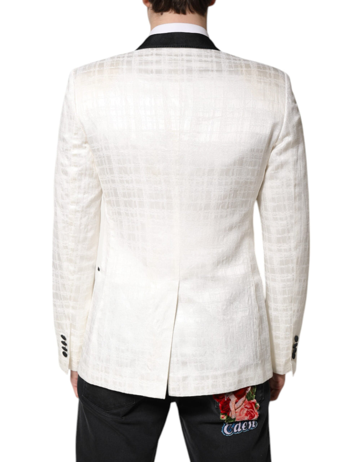 Elevate your wardrobe with the Dolce & Gabbana White Black Single Breasted Coat Blazer Suit, a masterpiece of Italian craftsmanship that embodies timeless elegance and sophistication.