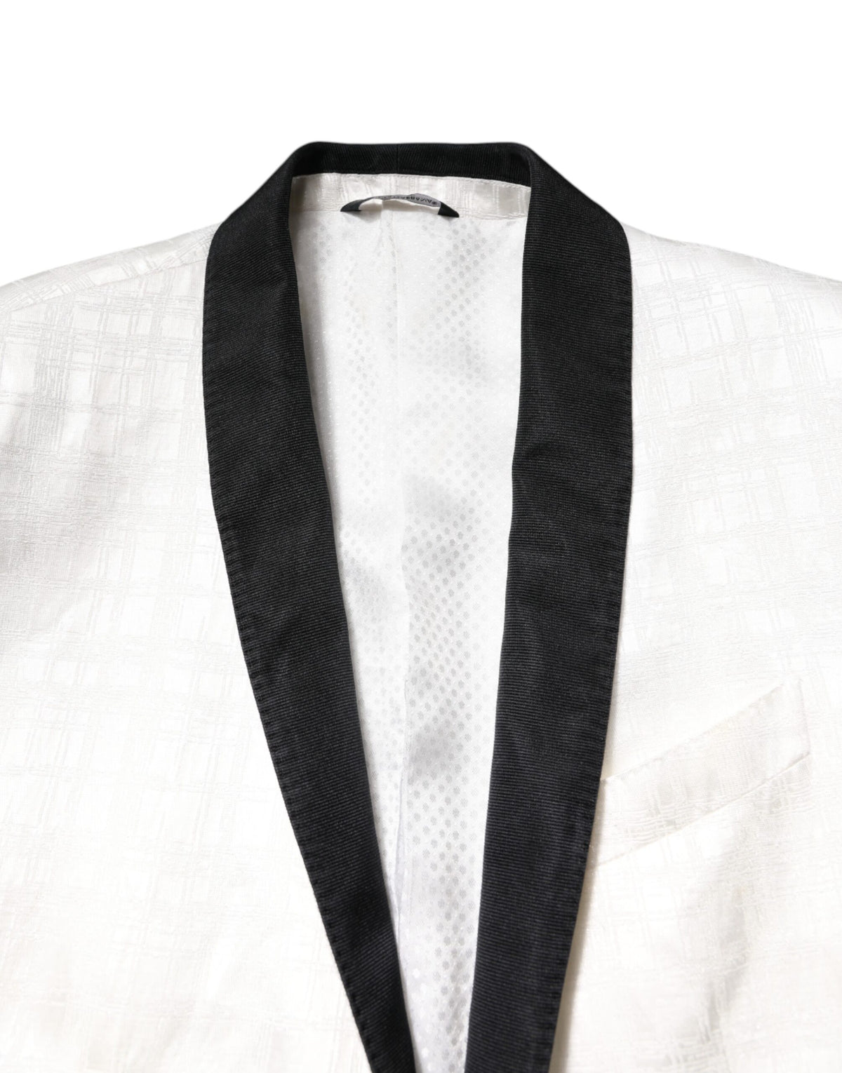 Elevate your wardrobe with the Dolce & Gabbana White Black Single Breasted Coat Blazer Suit, a masterpiece of luxurious craftsmanship and timeless elegance.