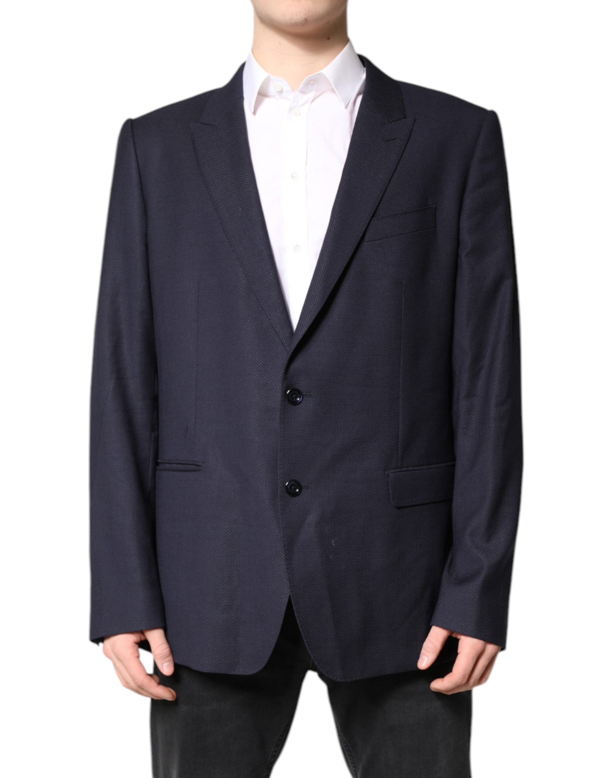 Experience the exquisite allure of Dolce & Gabbana's Black Wool Single Breasted Coat Blazer Suit, a masterpiece of Italian craftsmanship blending luxurious virgin wool and silk for timeless elegance.