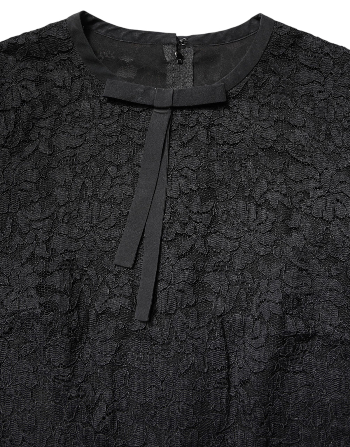 Indulge in the exquisite allure of Dolce & Gabbana's Black Lace STAFF Top, where luxurious floral lace and impeccable craftsmanship elevate your style for any occasion.