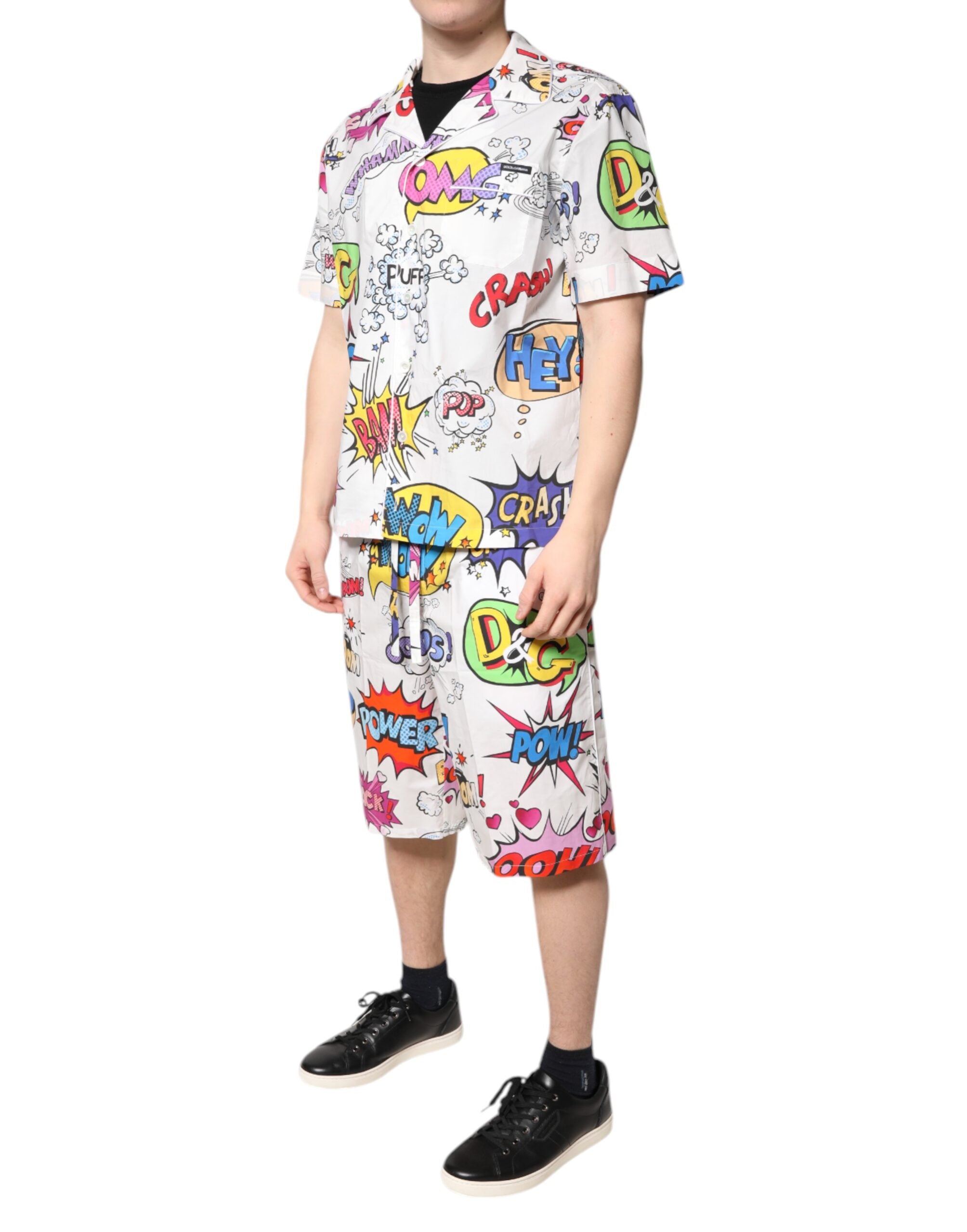 Elevate your lounging experience with the Dolce & Gabbana White Cartoon Print Cotton Men Pajama Set, a luxurious blend of playful charm and refined Italian craftsmanship.