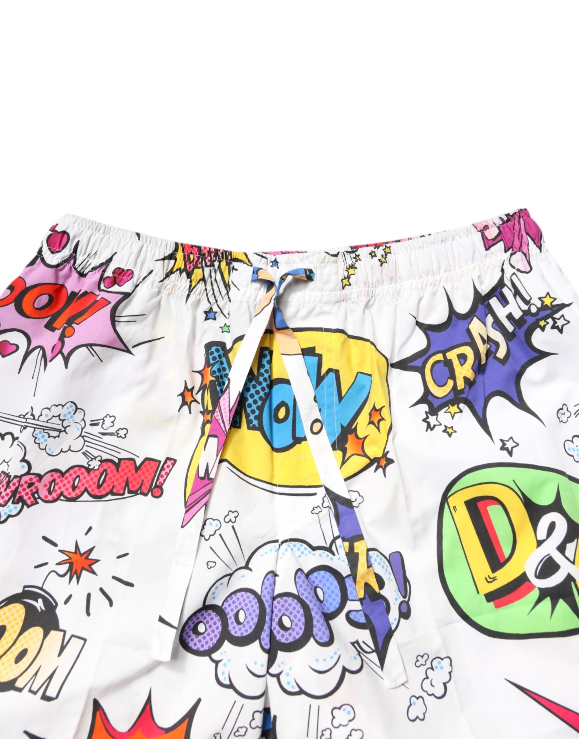 Indulge in the Dolce & Gabbana White Cartoon Print Cotton Pajama Set, where exquisite Italian craftsmanship meets playful elegance for the discerning individual.