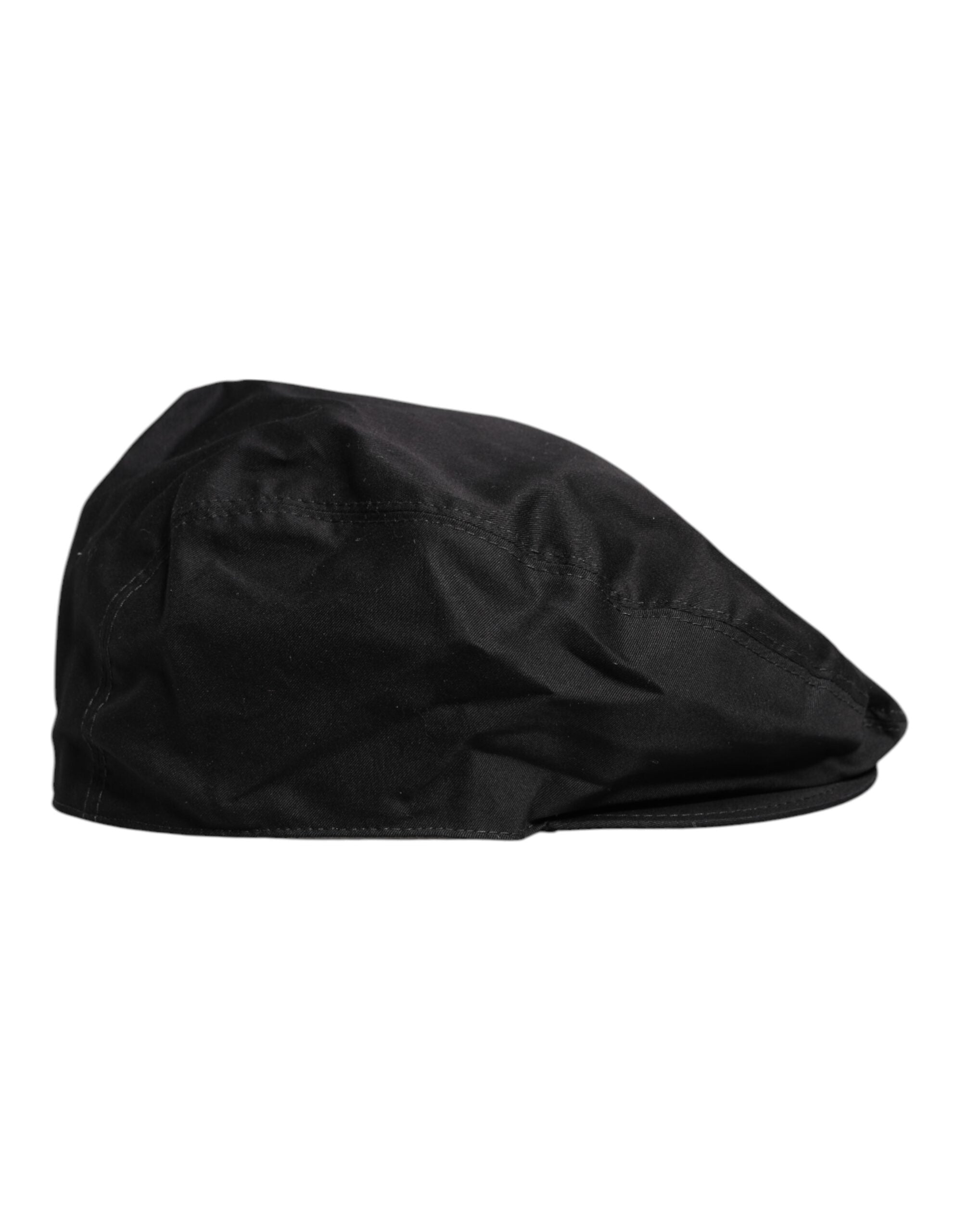Experience the allure of Dolce & Gabbana's Black Cotton Newsboy Capello Cabbie Hat, where Italian craftsmanship meets timeless elegance, perfect for the discerning individual.