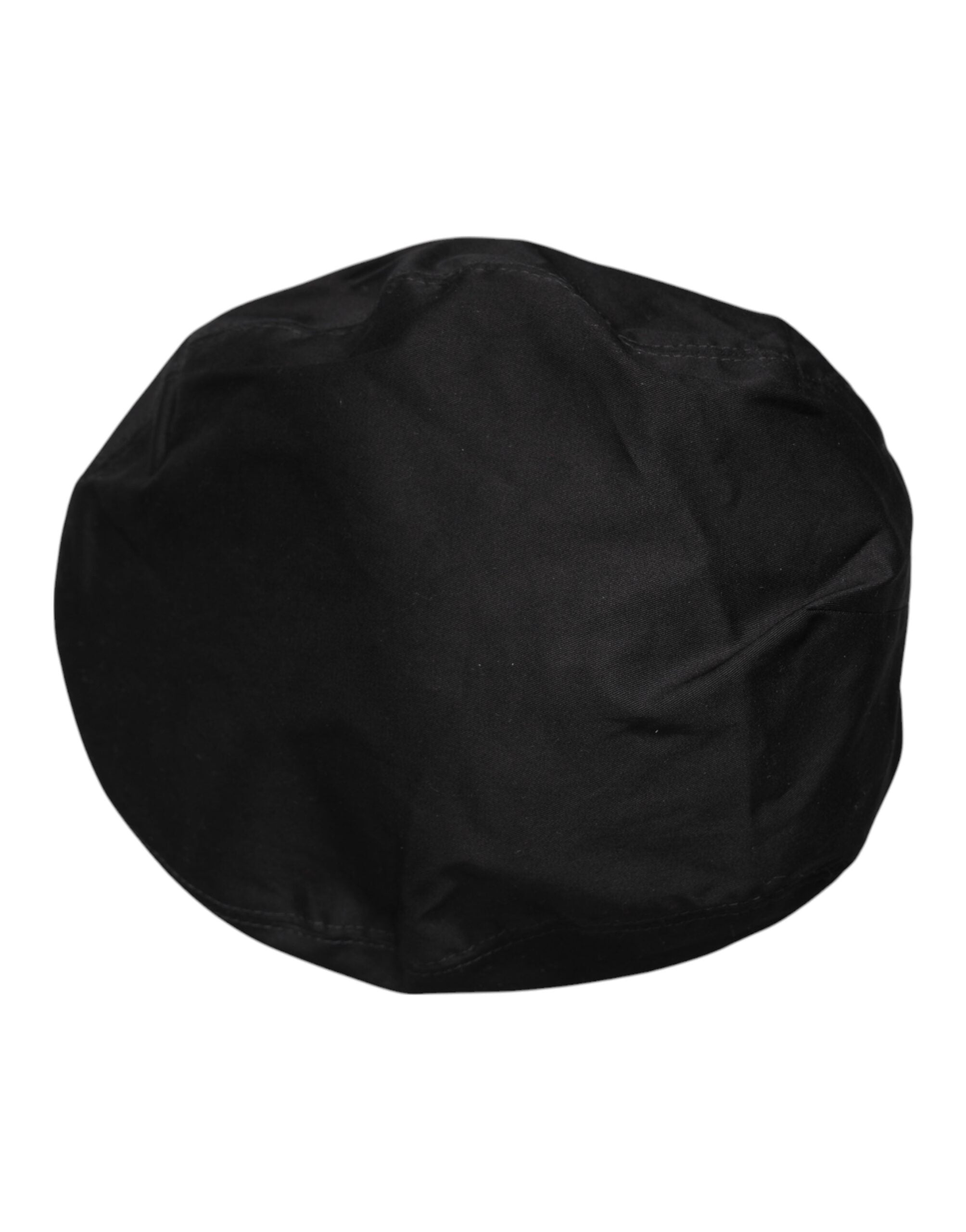 Discover the Dolce & Gabbana Black Cotton Newsboy Capello Cabbie Hat, a masterpiece of Italian craftsmanship that embodies timeless elegance and sophisticated allure.