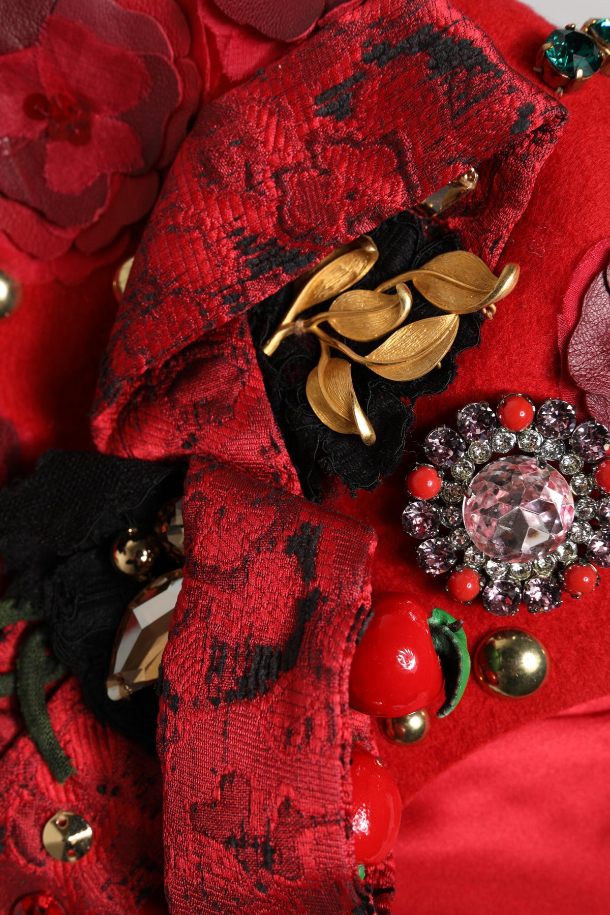 Elevate your style with the Dolce & Gabbana Red Crystal Gold Roses Brooch Hat, a masterpiece of Italian craftsmanship that embodies luxury and timeless elegance.