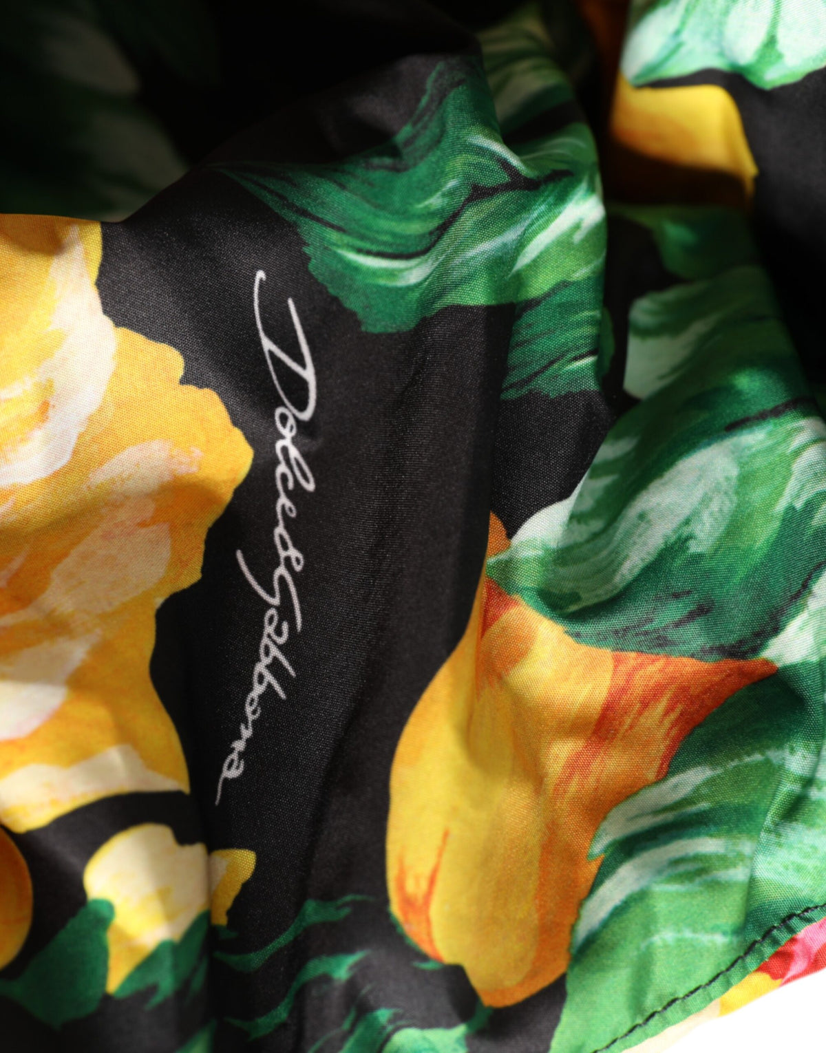 Indulge in the artistry of the Dolce & Gabbana Multicolor Floral Print Whole Head Wrap Hat, a luxurious blend of vibrant design and Italian craftsmanship, perfect for elevating any occasion.