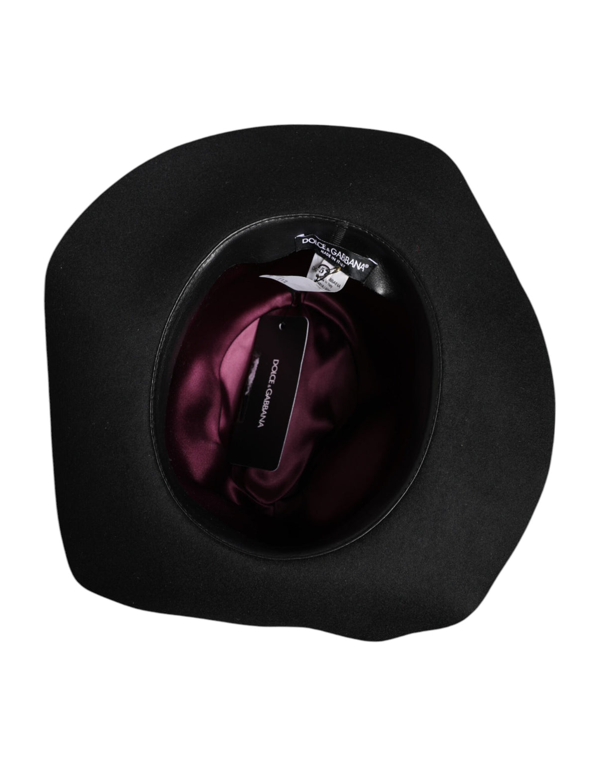 Discover the Dolce & Gabbana Black Wide Brim Trilby Fedora Hat, a handcrafted masterpiece in premium wool felt, embodying timeless elegance and artisanal luxury for the discerning individual.