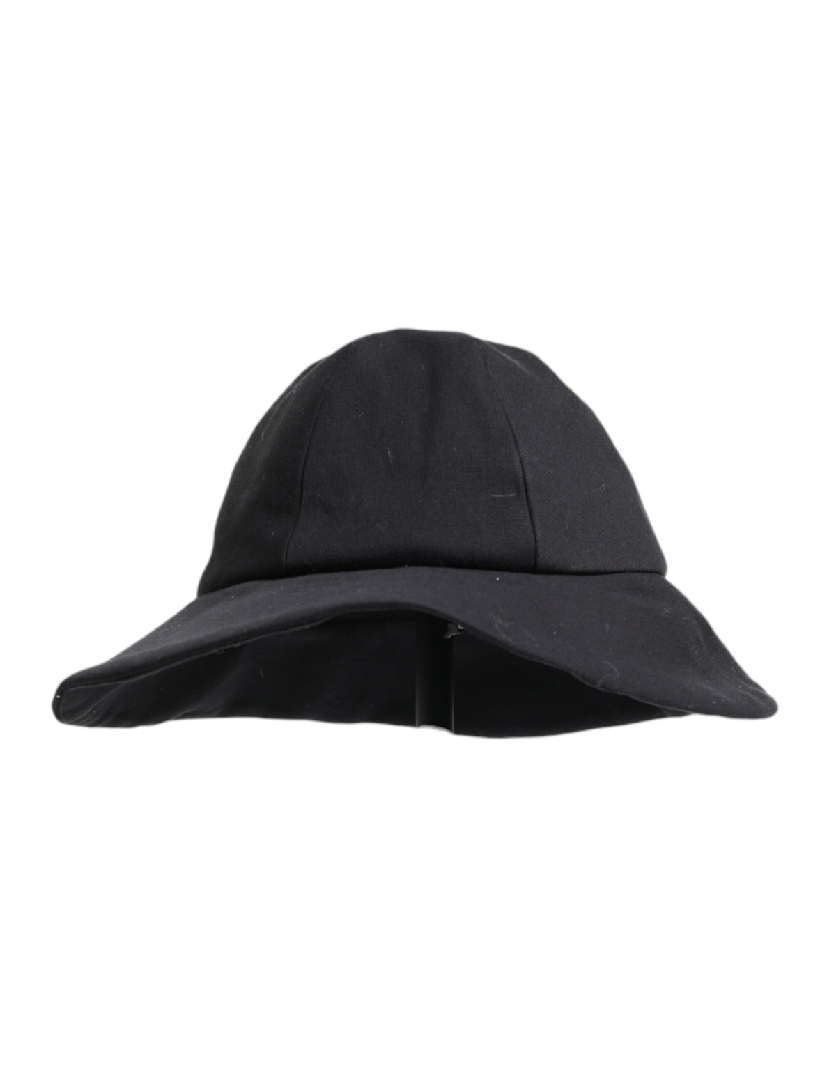 Indulge in the Dolce & Gabbana Black Cotton Wide Brim Bucket Hat, a masterpiece of Italian craftsmanship that elevates your style with luxurious comfort and timeless elegance.