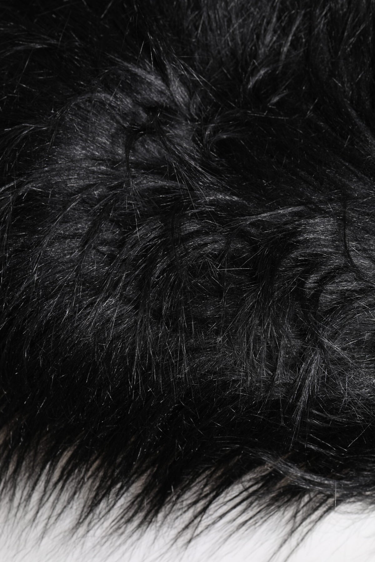 Indulge in the exquisite Dolce & Gabbana Black Acrylic Fur Women's Bucket Hat, a timeless accessory that embodies luxury and sophistication, perfect for any elegant ensemble.