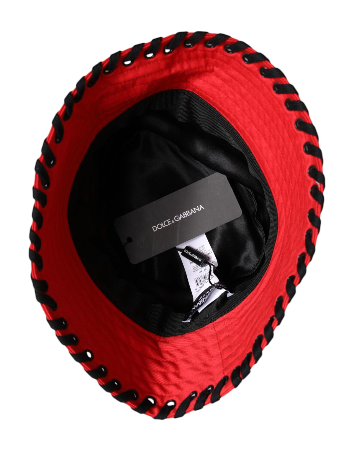 Elevate your style with the Dolce & Gabbana Red Lace Wide Brim Bucket Hat, a masterpiece of artisanal elegance, crafted in Italy for timeless sophistication.