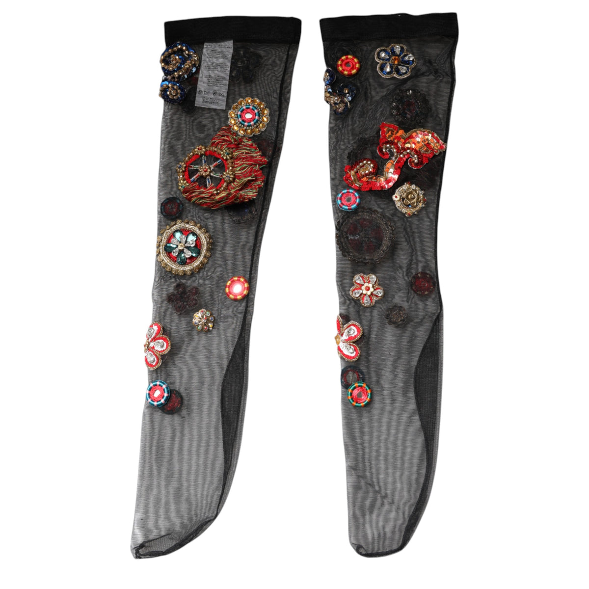 Elevate your allure with Dolce & Gabbana's Black Stretch Carretto Crystal Stockings, a masterpiece of Italian craftsmanship, blending luxurious nylon and elastane for timeless elegance.
