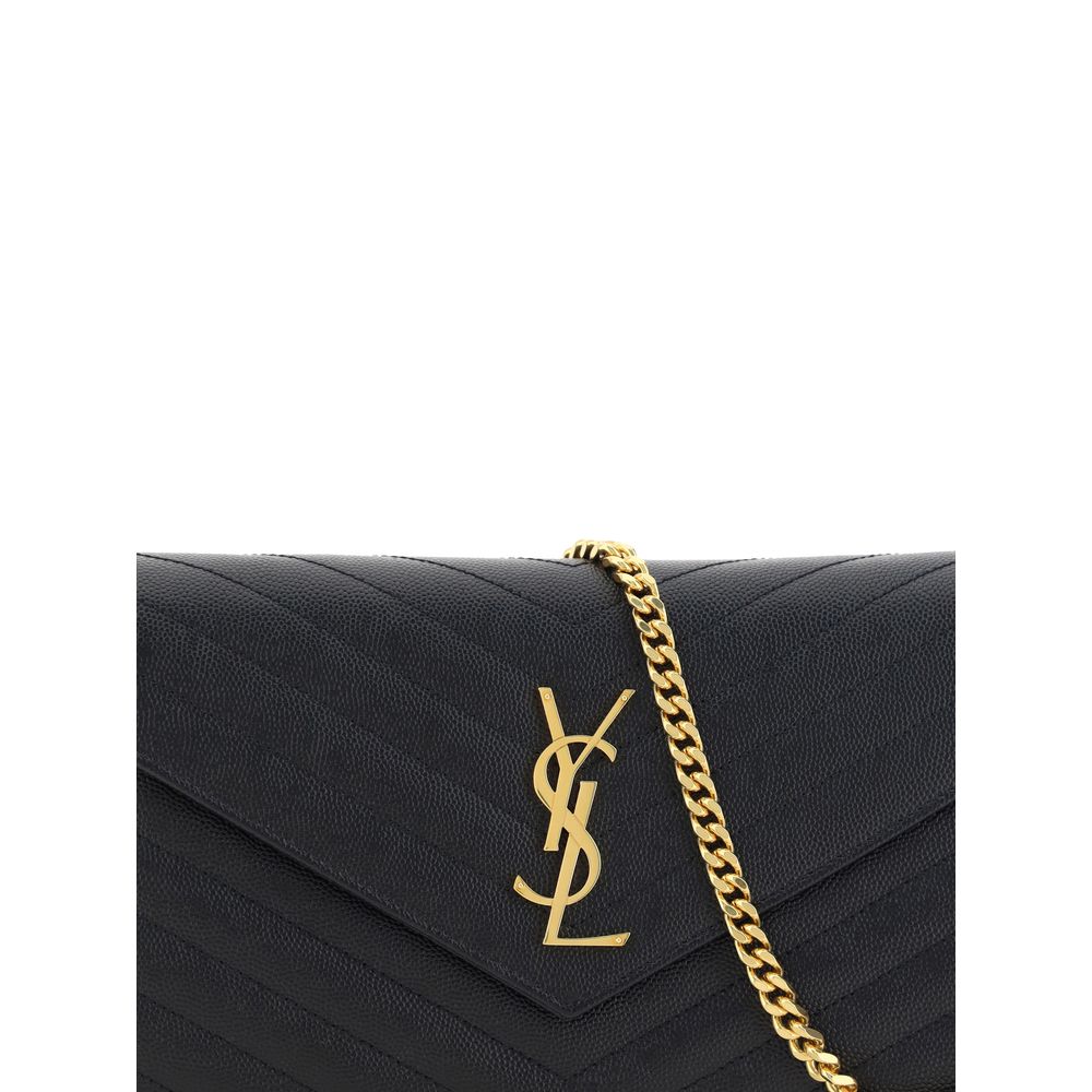 Indulge in the Saint Laurent Black Calf Leather Bos Taurus Shoulder Bag, a masterpiece of artisanal elegance that enhances your style with timeless sophistication.