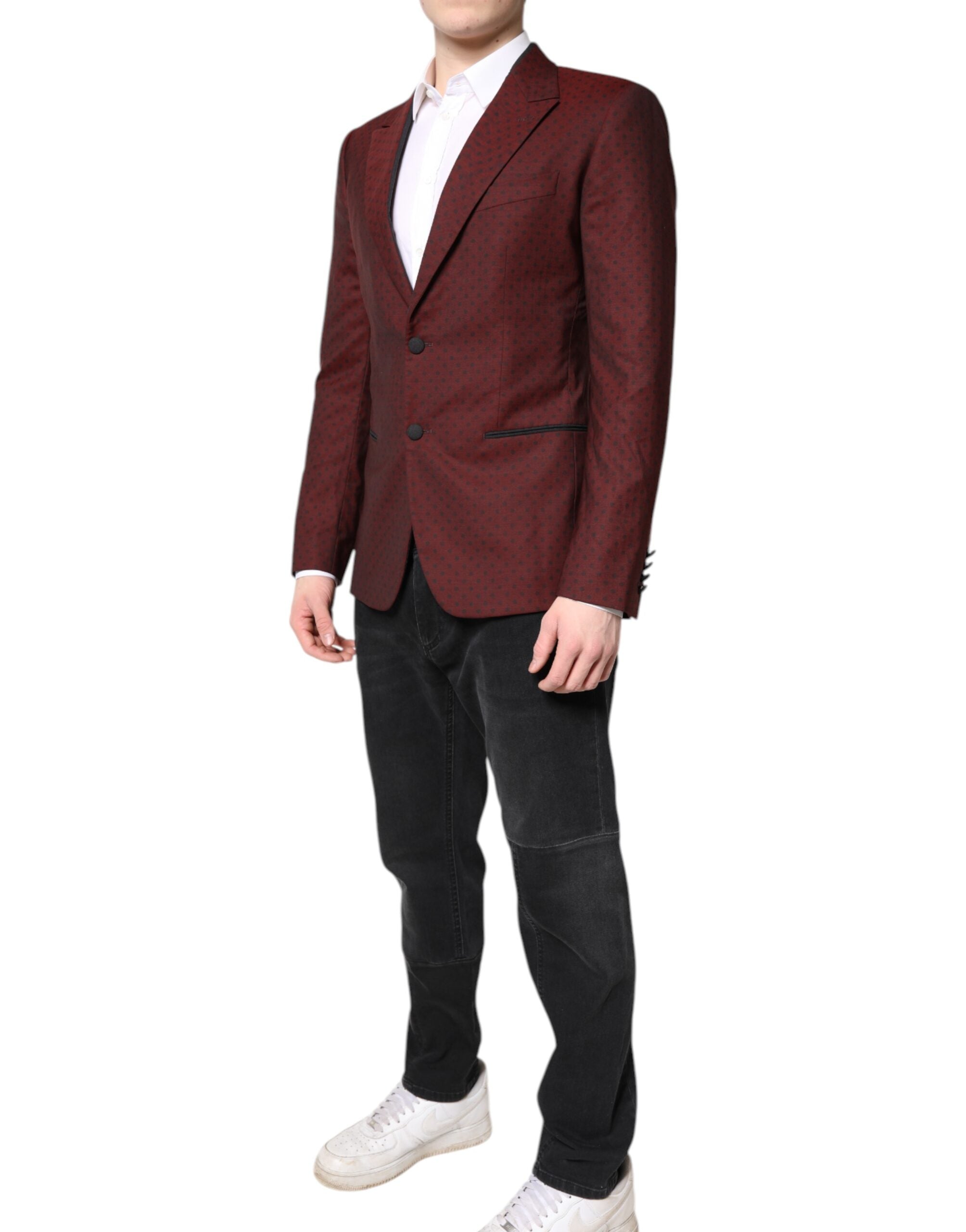 Experience the exquisite allure of Dolce & Gabbana's Maroon Wool Slim Fit Blazer, a masterful blend of virgin wool and artisanal craftsmanship, perfect for the discerning individual.