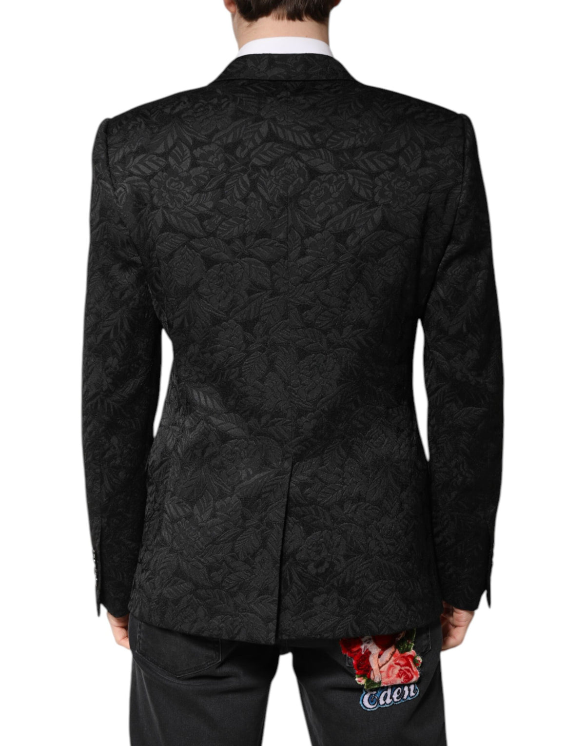 Experience the allure of the Dolce & Gabbana Black MARTINI Brocade Blazer, a masterpiece of Italian craftsmanship, blending luxurious silk and brocade for timeless elegance.