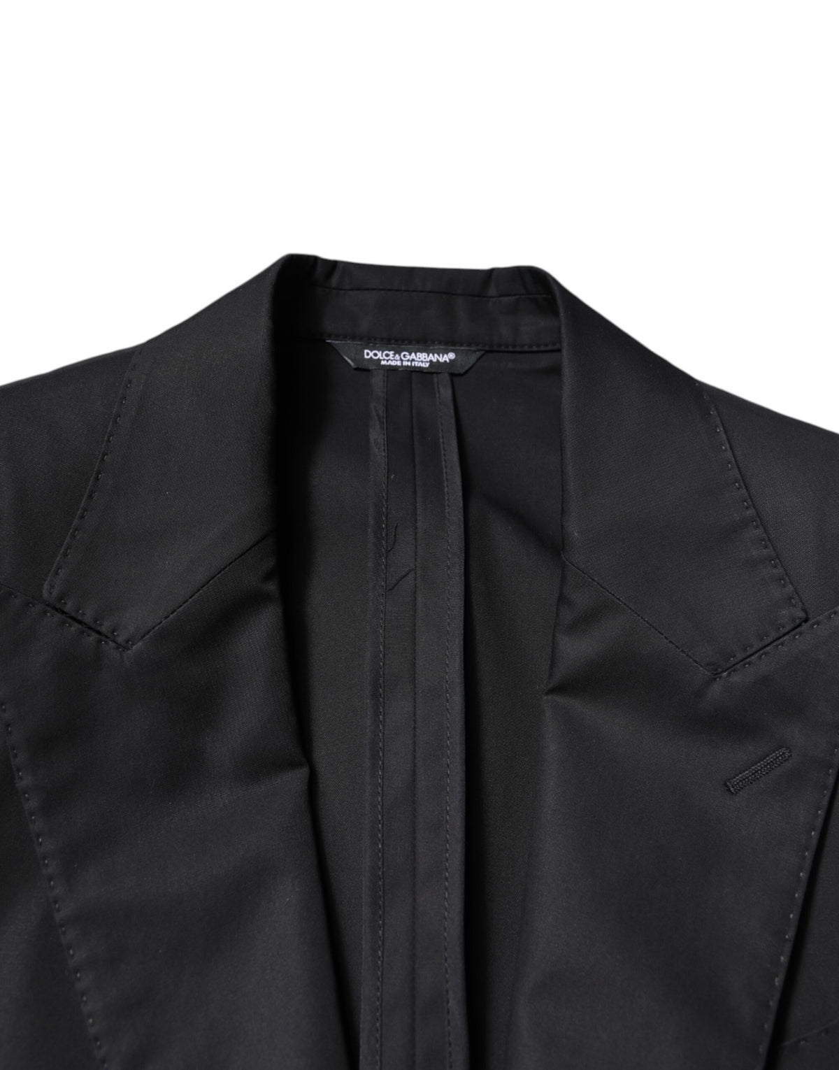 Indulge in the exquisite Dolce & Gabbana Black Cotton Single Breasted Men Coat Blazer, crafted from luxurious materials, embodying timeless elegance and sophisticated allure.