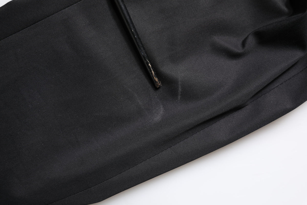 Indulge in the exquisite Dolce & Gabbana Black Cotton Single Breasted Men Coat Blazer, a masterpiece of Italian craftsmanship that embodies timeless luxury and sophistication.
