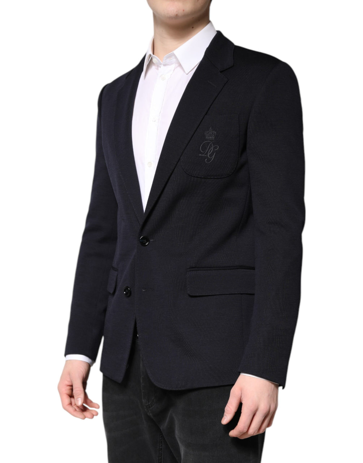Indulge in the elegance of the Dolce & Gabbana Black Wool Single Breasted Coat Suit Blazer, a timeless masterpiece of Italian craftsmanship that elevates your style and confidence.