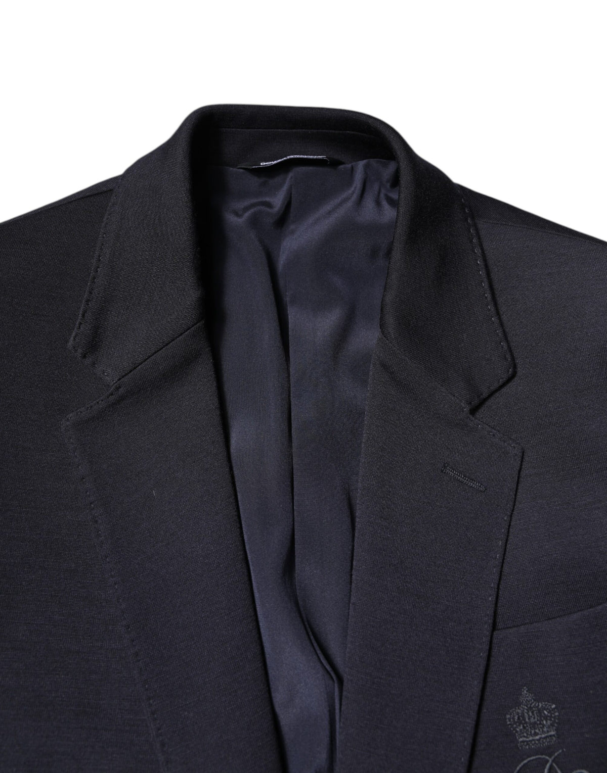 Elevate your wardrobe with the Dolce & Gabbana Black Wool Single Breasted Coat Suit Blazer, a timeless piece of Italian craftsmanship that embodies luxury and sophistication.