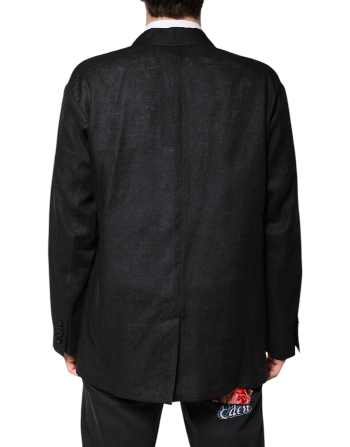 Experience the allure of Dolce & Gabbana's Black Linen Single Breasted Men Coat Blazer, a testament to Italian craftsmanship and timeless elegance, perfect for the discerning individual.