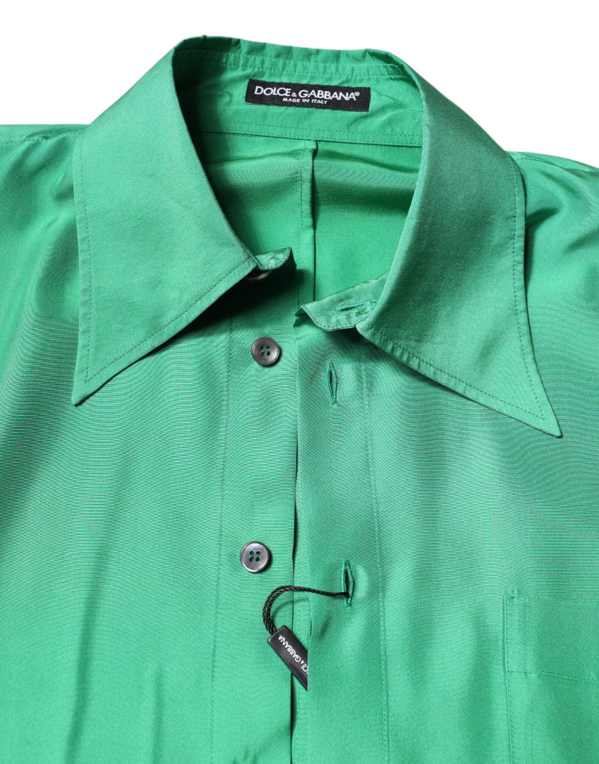 Indulge in the exquisite allure of Dolce & Gabbana's Green Silk Satin Long Sleeves Casual Shirt, a masterpiece of Italian craftsmanship that elevates your style with timeless elegance.