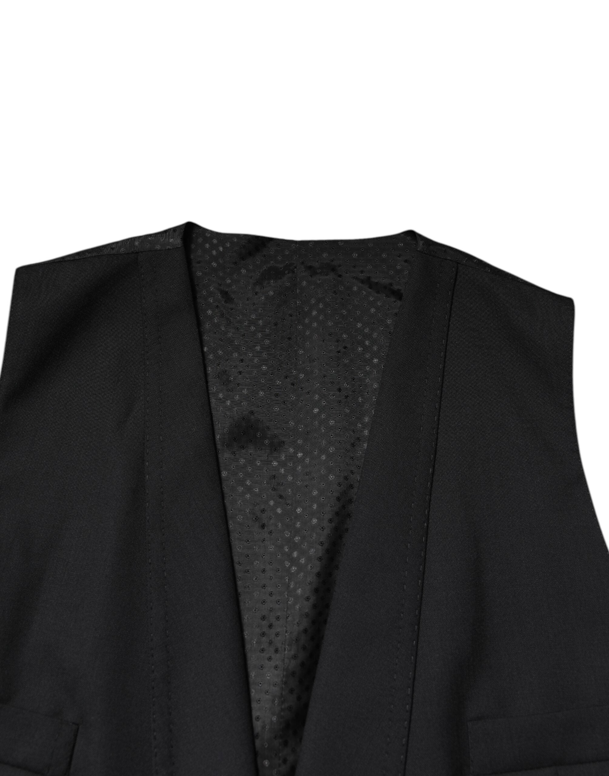 Indulge in the exquisite Dolce & Gabbana Black Single Breasted Formal Blazer with Vest, a timeless masterpiece of Italian craftsmanship that redefines luxury and elegance.