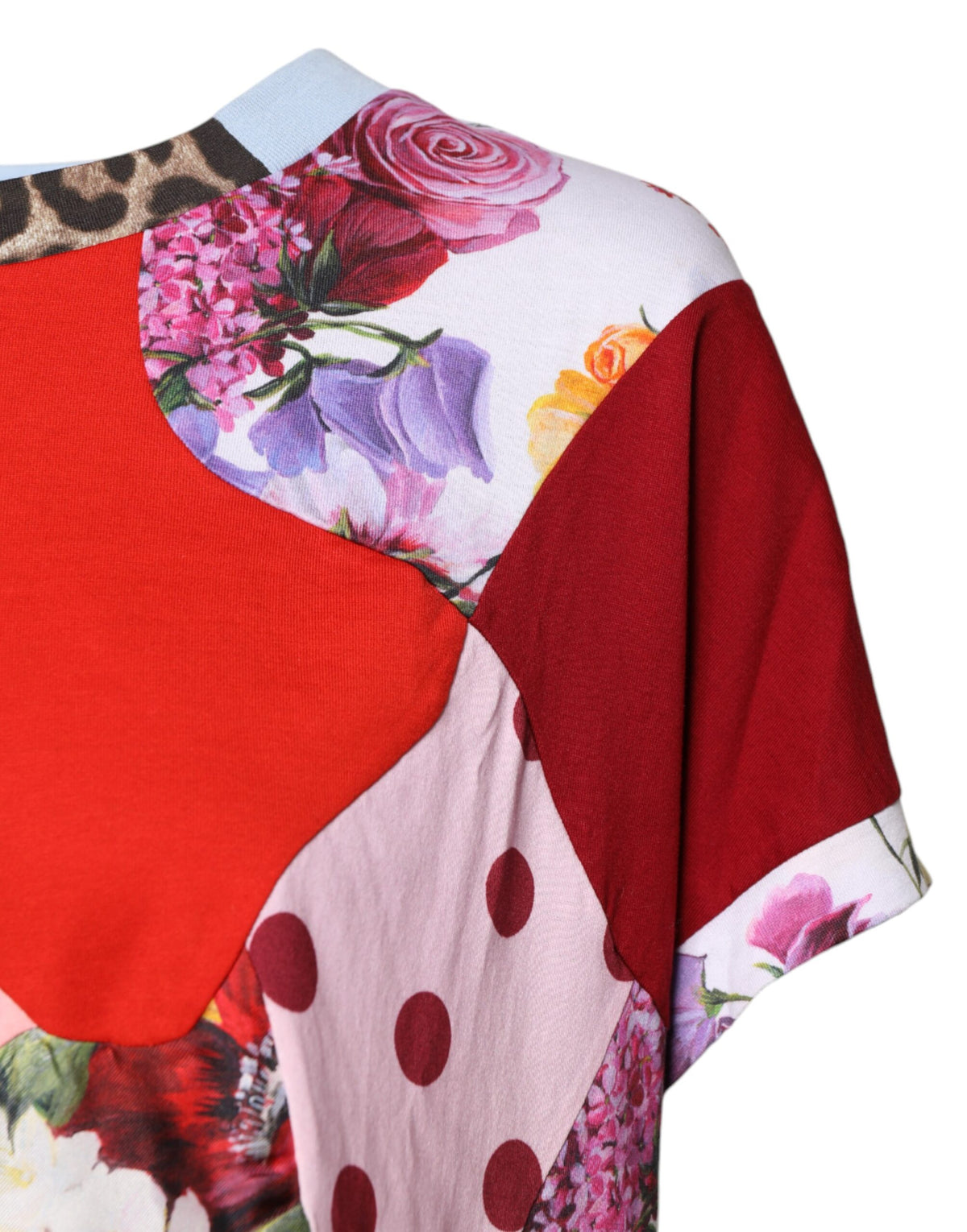 Elevate your wardrobe with the Dolce & Gabbana Multicolor Patchwork Short Sleeve Blouse Top, a luxurious blend of cotton and silk, crafted in Italy for timeless elegance.