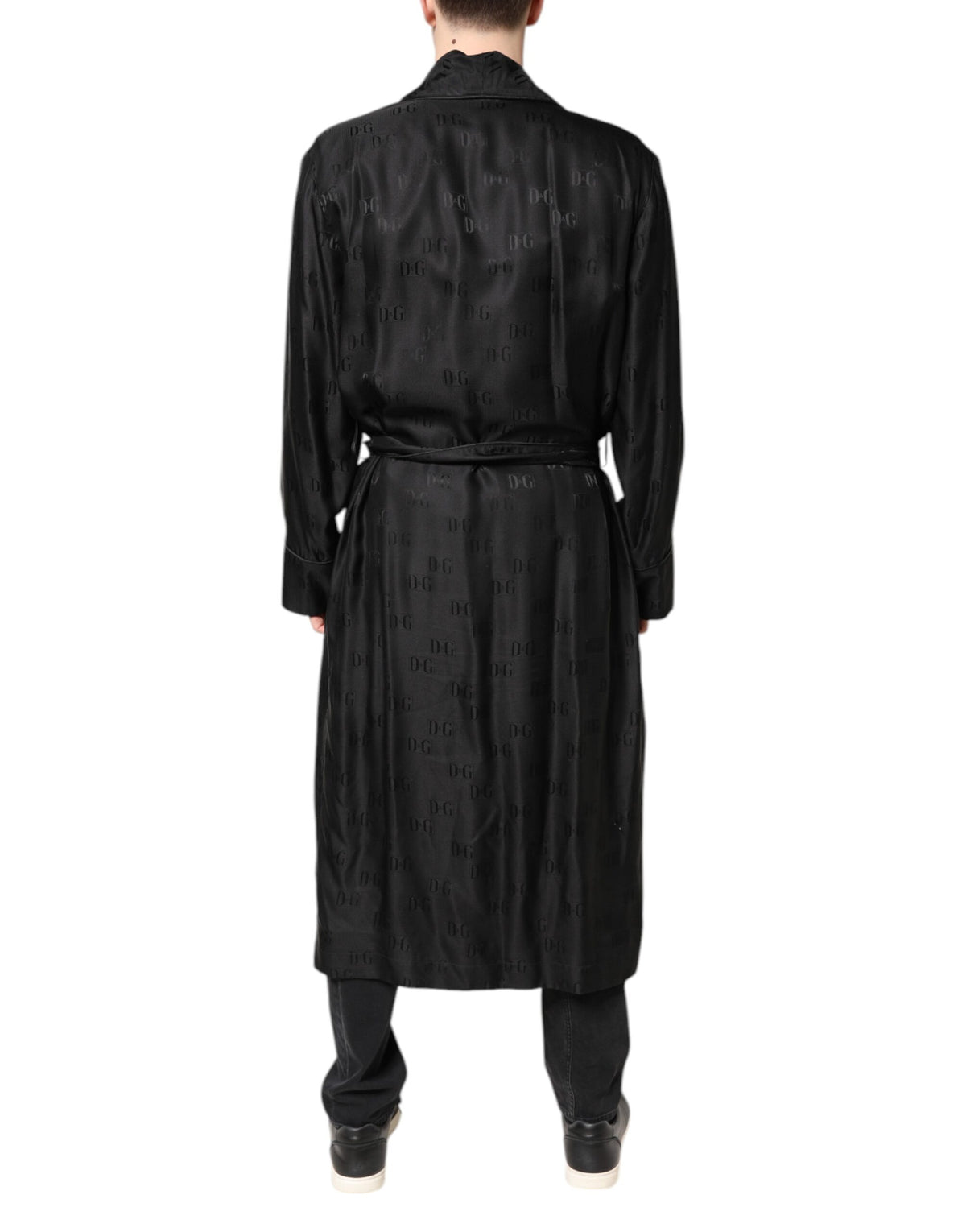Indulge in the exquisite Dolce & Gabbana Black Silk DG Logo Wrap Robe Jacket, a masterpiece of Italian craftsmanship that embodies timeless elegance and luxurious allure.