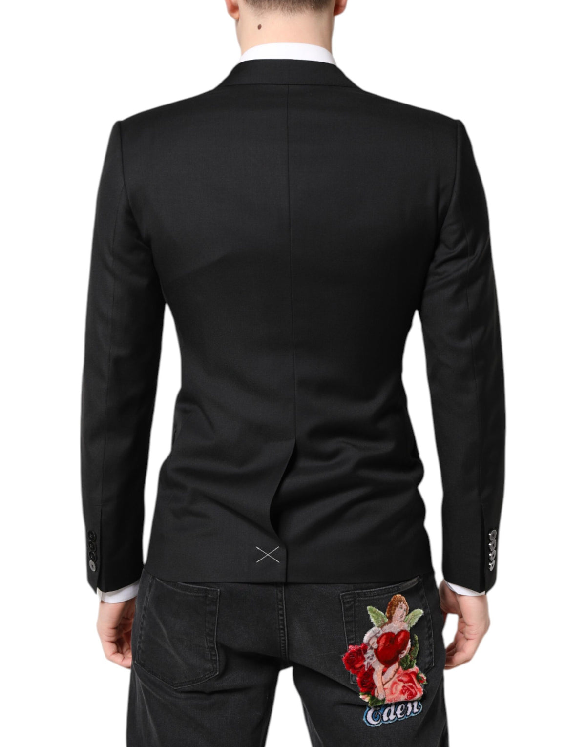 Indulge in the Dolce & Gabbana Black MARTINI Double Breasted Coat Blazer, a timeless masterpiece of 100% Virgin Wool, embodying exquisite craftsmanship and sophisticated elegance for the discerning individual.