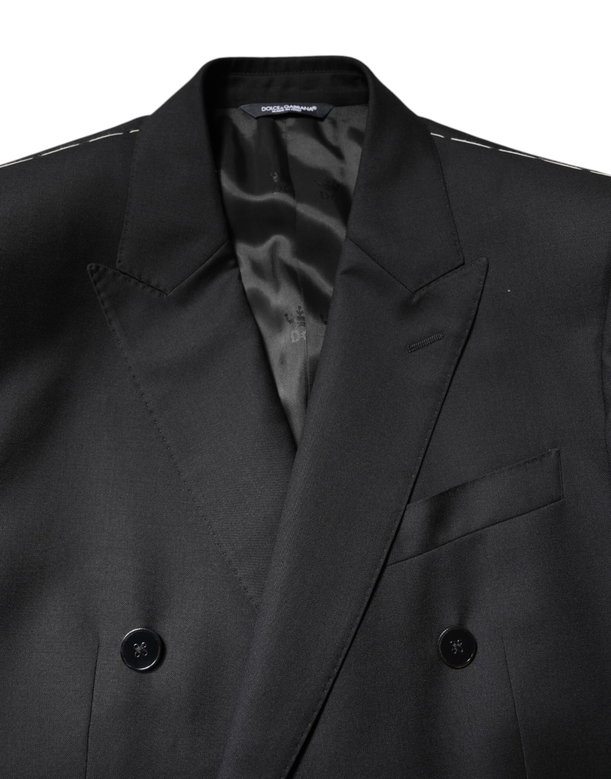 Indulge in the Dolce & Gabbana Black MARTINI Double Breasted Coat Blazer, crafted from 100% Virgin Wool, embodying timeless elegance and exquisite Italian craftsmanship for the discerning individual.