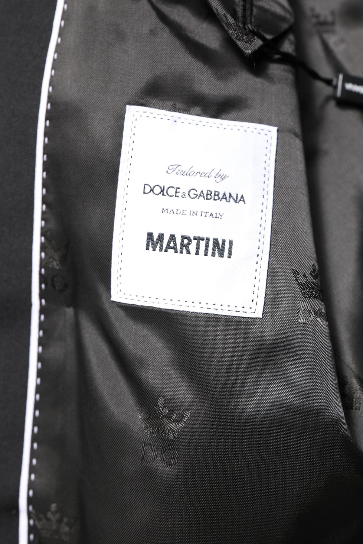 Indulge in the exquisite Dolce & Gabbana Black MARTINI Double Breasted Coat Blazer, crafted from 100% Virgin Wool, epitomizing timeless elegance and refined sophistication.