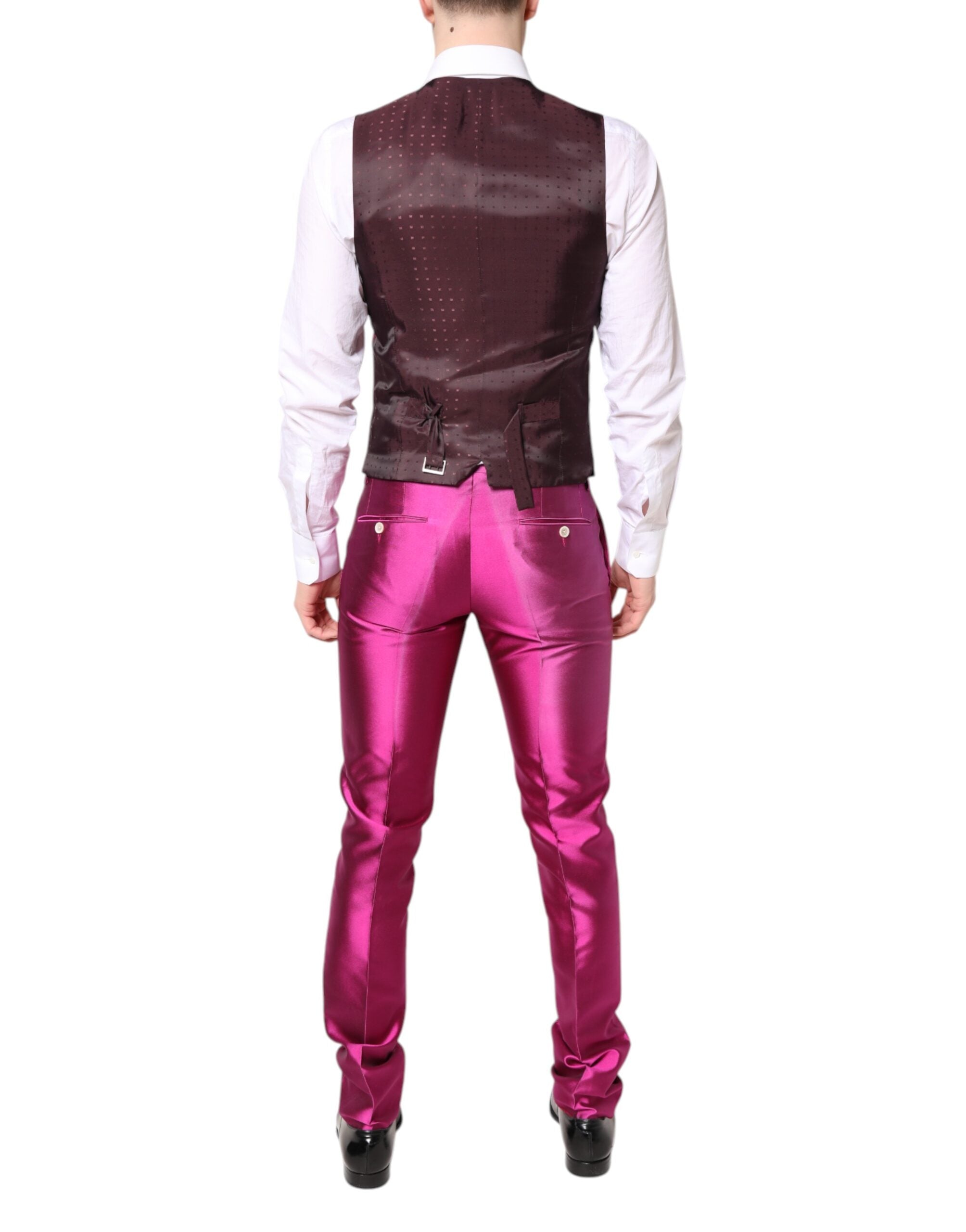 Experience the allure of the Dolce & Gabbana Pink SICILIA Double Breasted 3 Piece Suit, crafted from luxurious silk, epitomizing elegance for unforgettable moments.