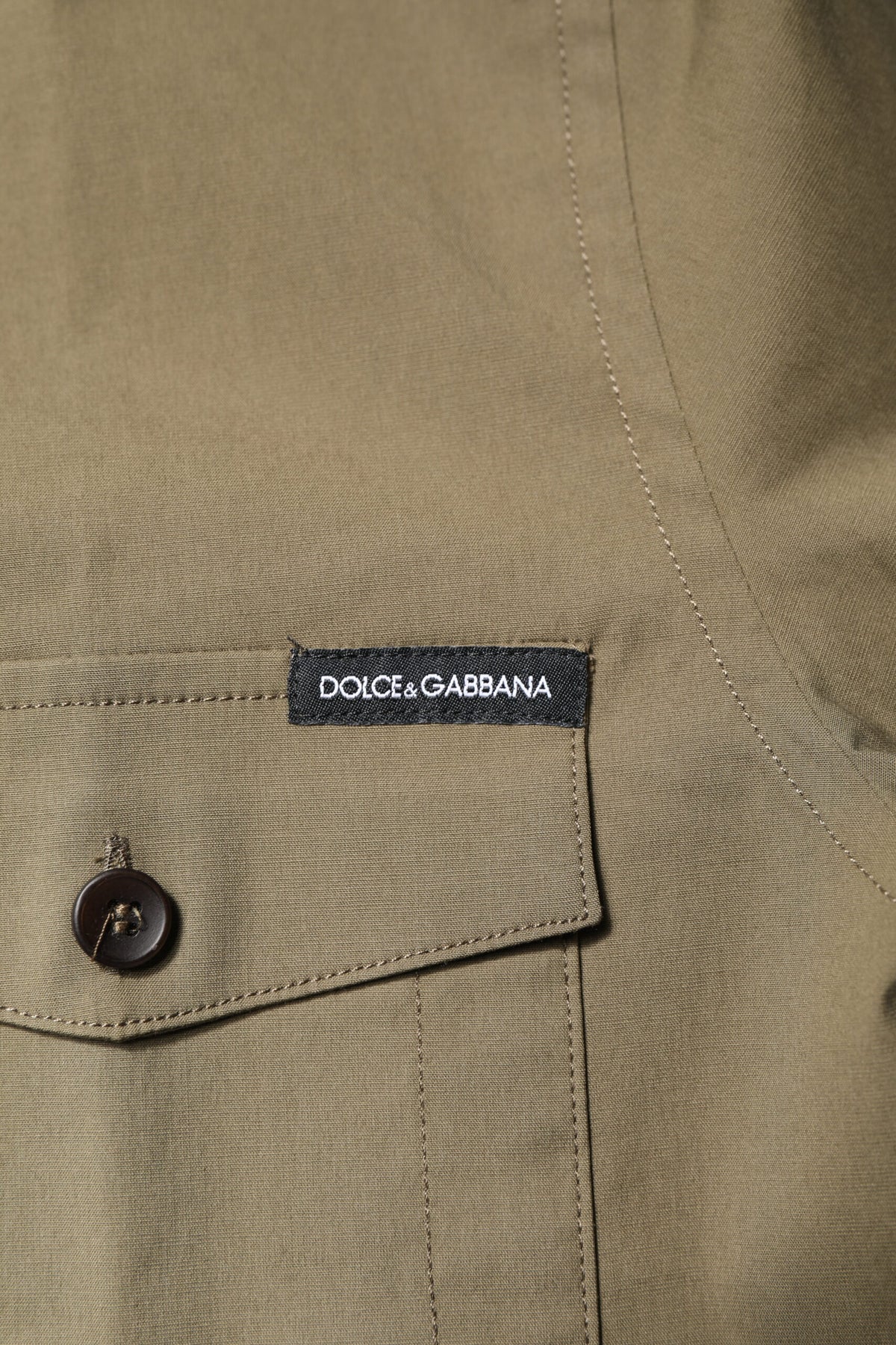Discover the exquisite Dolce & Gabbana Brown Cotton Stretch Casual Long Sleeves Shirt, where artisanal craftsmanship meets contemporary elegance for the discerning individual.
